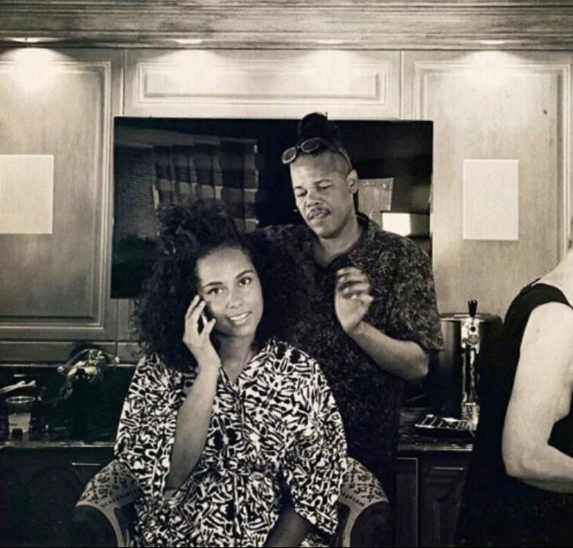 Chuckie Amos with Alicia Keys. Hair by Chuckie Amos. Image courtesy of Chuckie Amos.