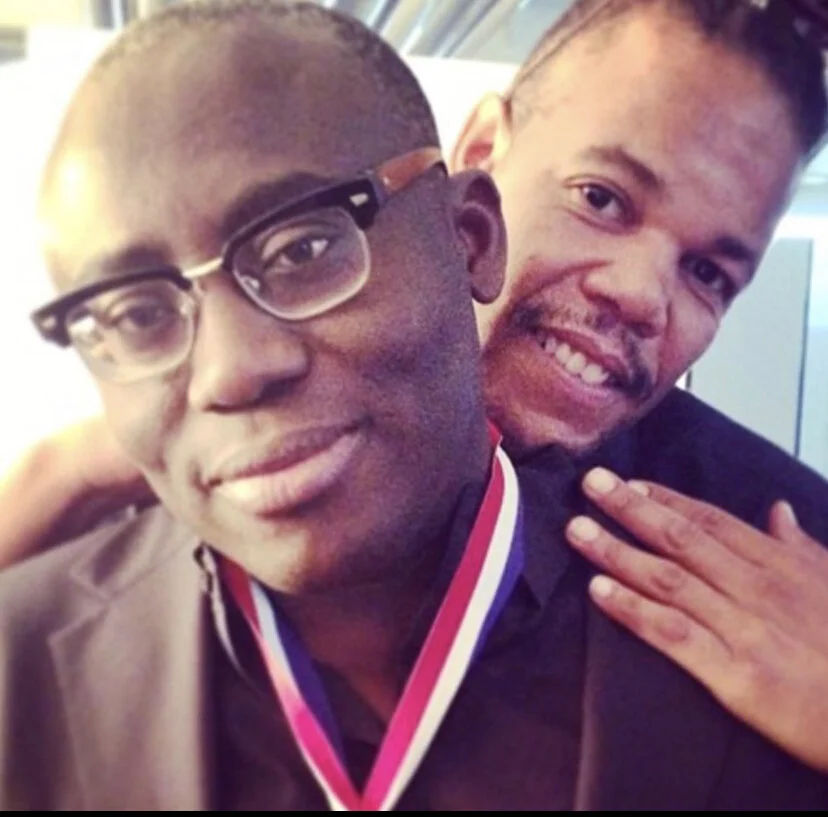 Chuckie Amos with British Vogue Editor in Chief Edward Enninful. Image courtesy of Chuckie Amos.
