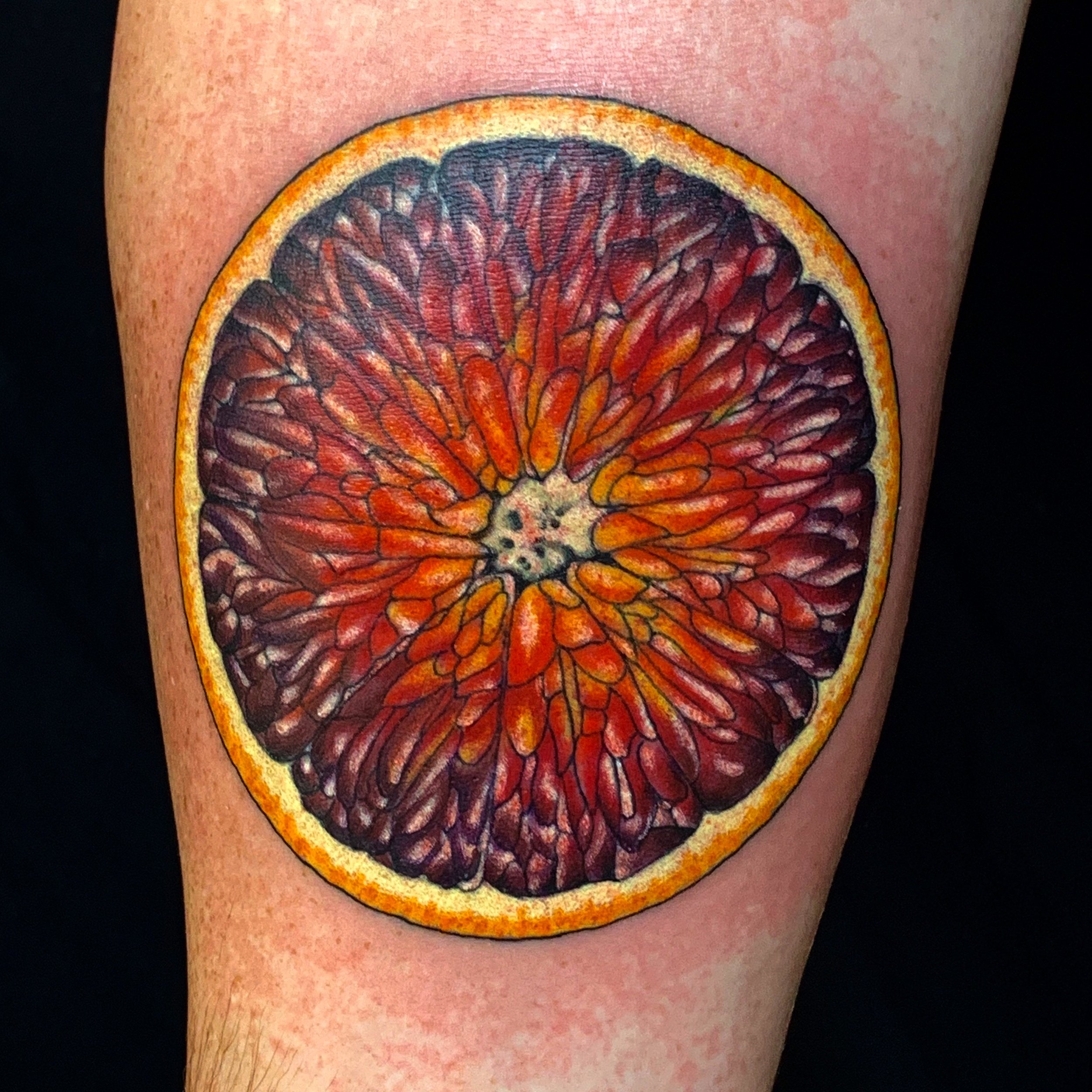 orange by Kim Reed TattooNOW