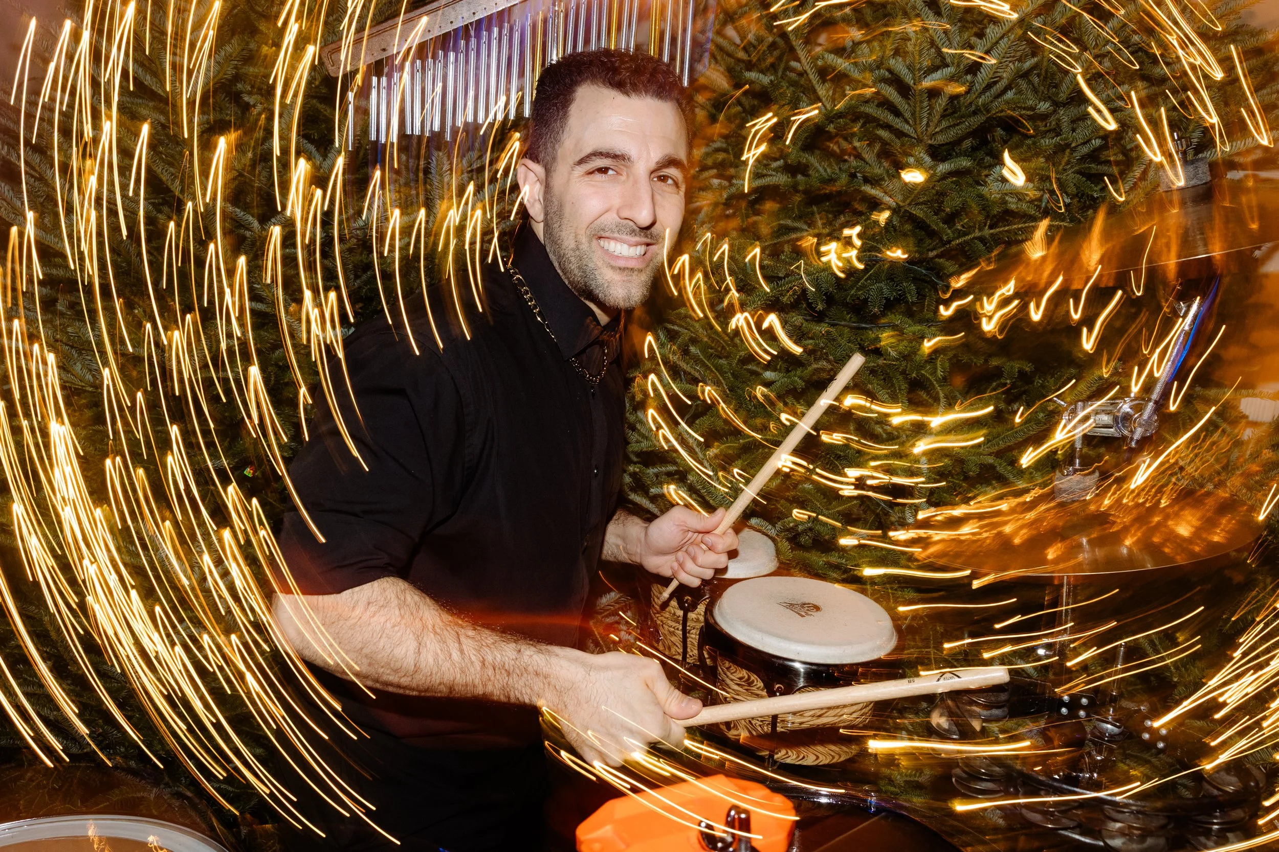 handsome, flashy, talented percussionist performs at wedding and high energy events