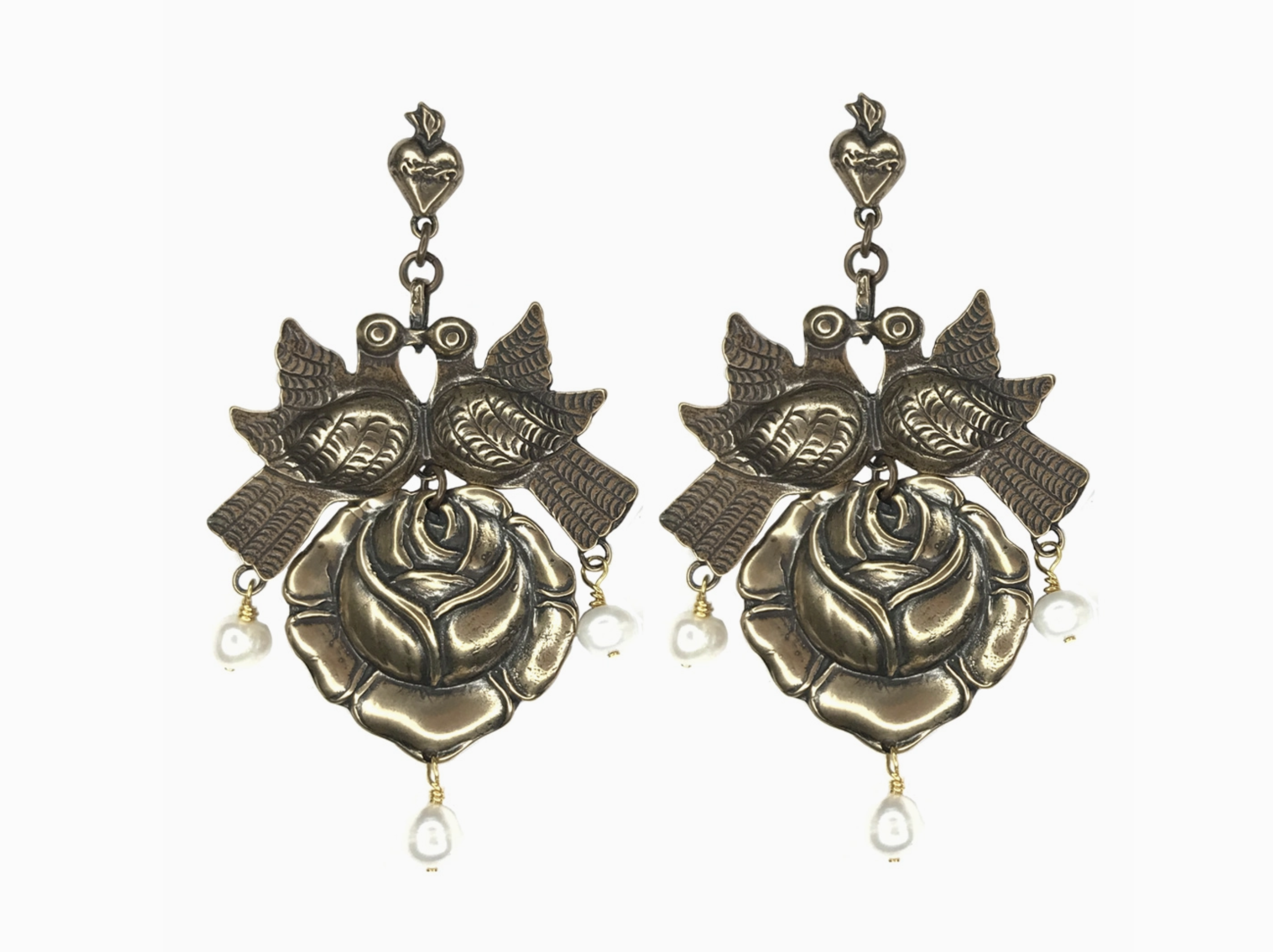 Chandelier earrings by Tara Gasparyan featuring two birds sitting a top arose with three pearls dangling