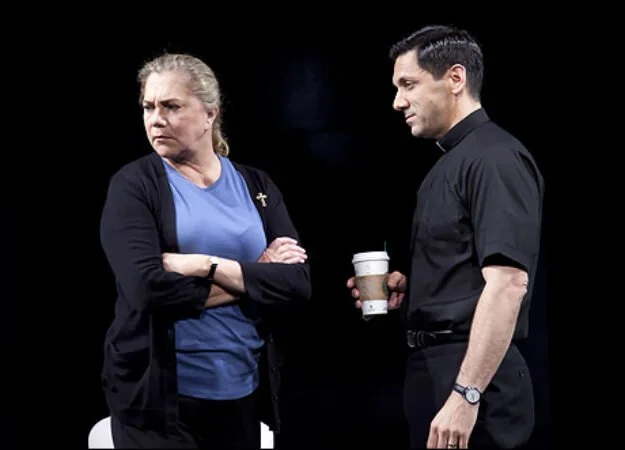 Father Michael Delpapp in High with Kathleen Turner (photo by Lanny Nagler)