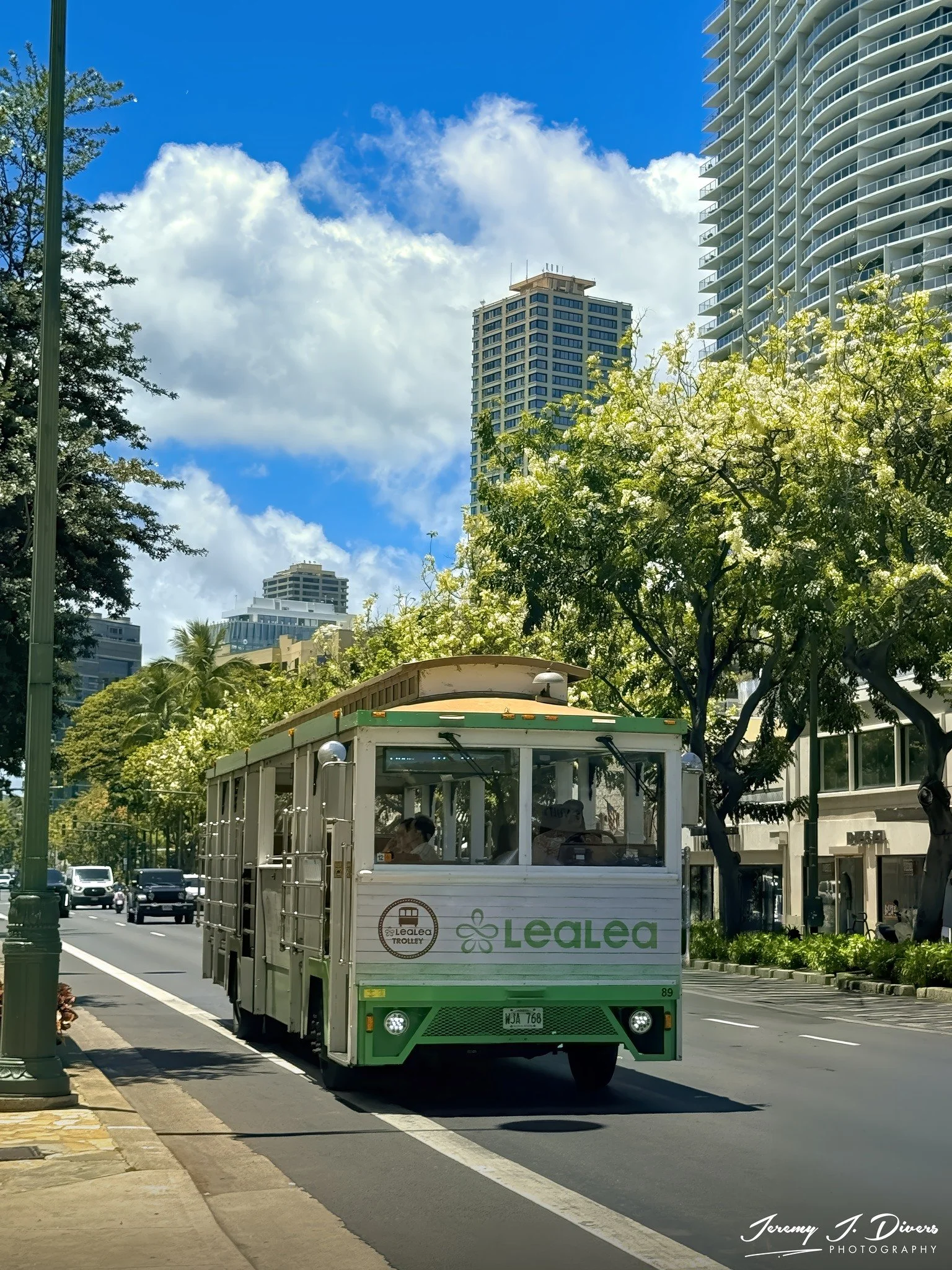 "The LeaLea Trolley on Kalākaua Avenue" Honolulu, Hawaii