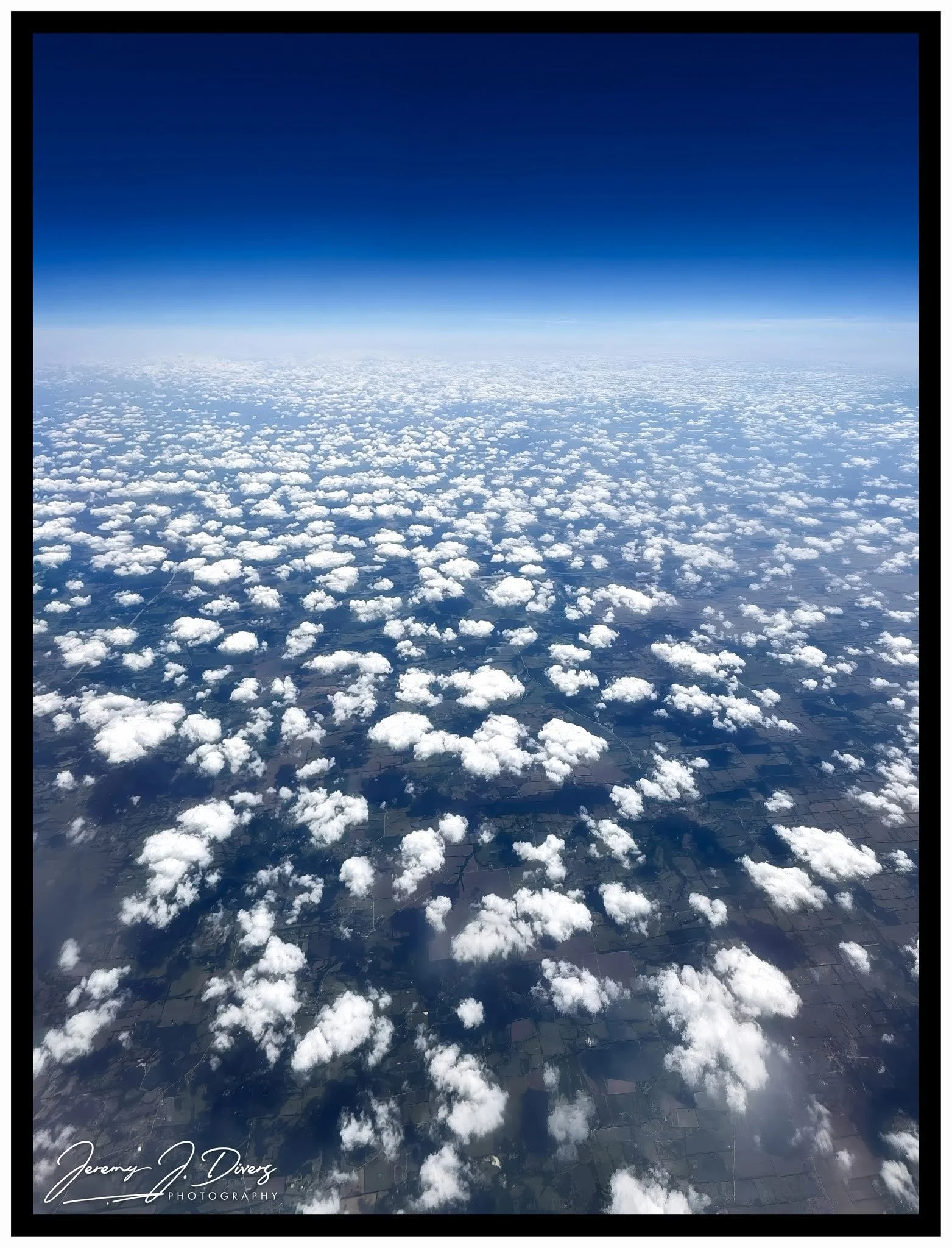 "Cumulus Clouds Over The Midwest," Somewhere Between Missouri and Texas