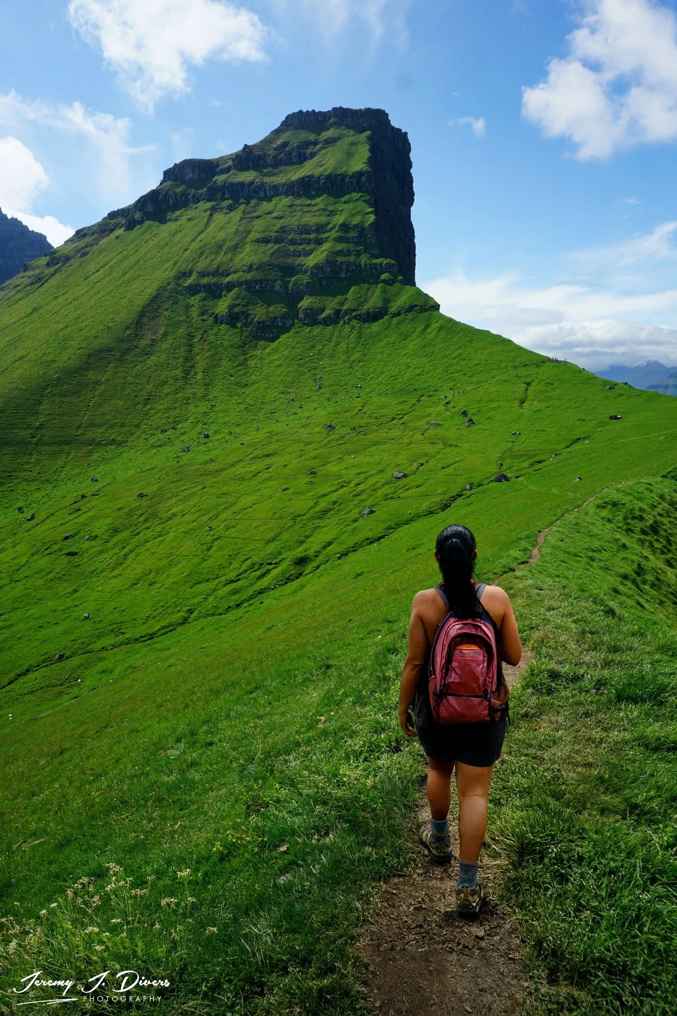 "Hiking to Adventure" near the village of Trøllanes, Faroe Islands