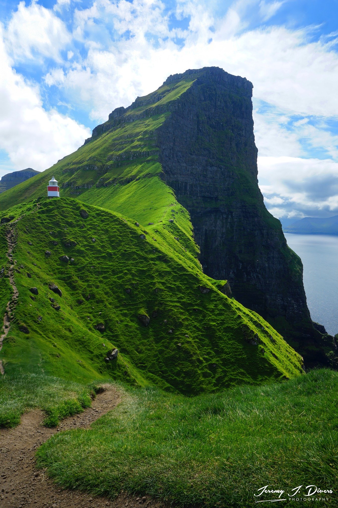 "Cliffs of Kalsoy and the Kallur Lighthouse" near the village of Trøllanes, Faroe Islands