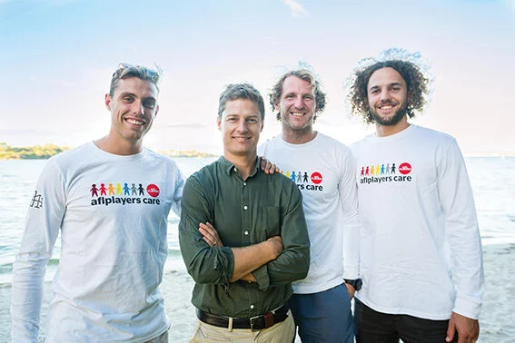 Fremantle Dockers players Tommy Sheridan, David Mundy and Griffin Logue, with Fremantle Foundation’s Dylan Smith.