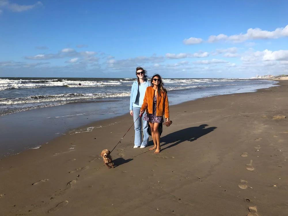 Enjoying a beach walk after our afternoon treats.