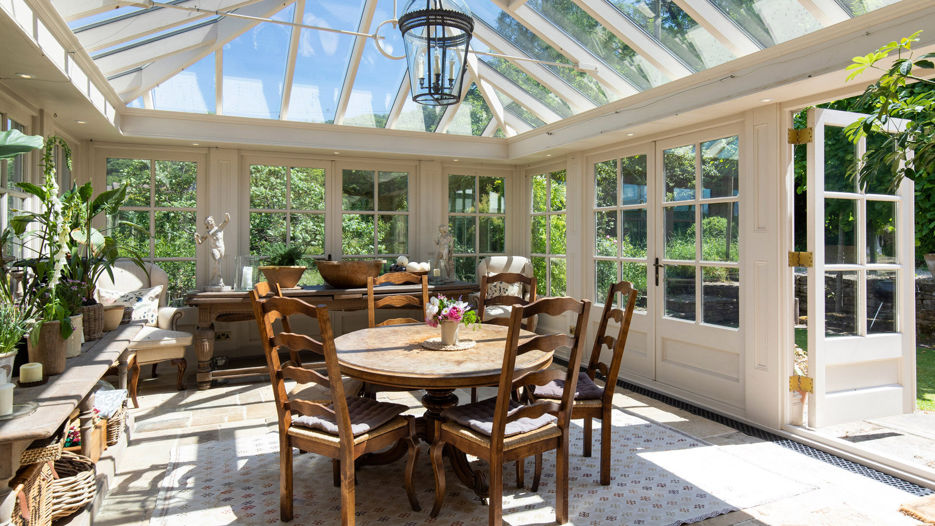 Sheepscombe-House-conservatory-dining-room.jpg