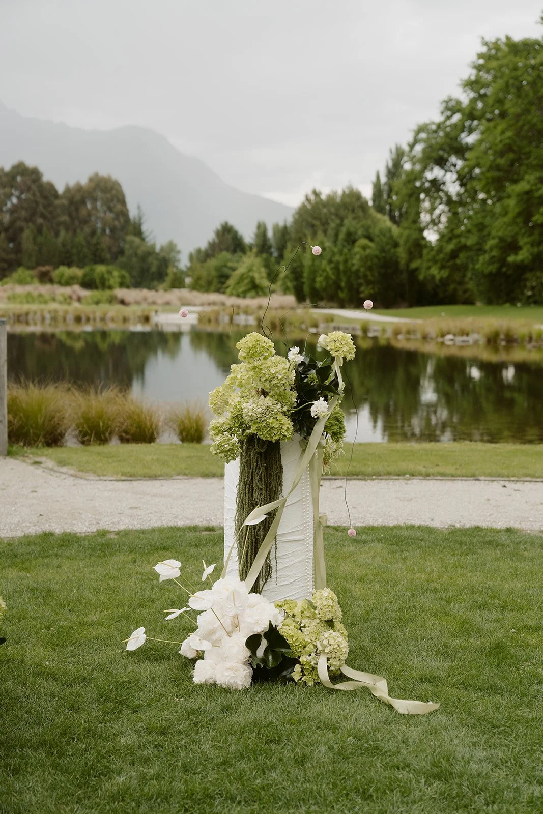 Modern sculptural wedding ceremony styling at Ayrburn The Pond Queenstown