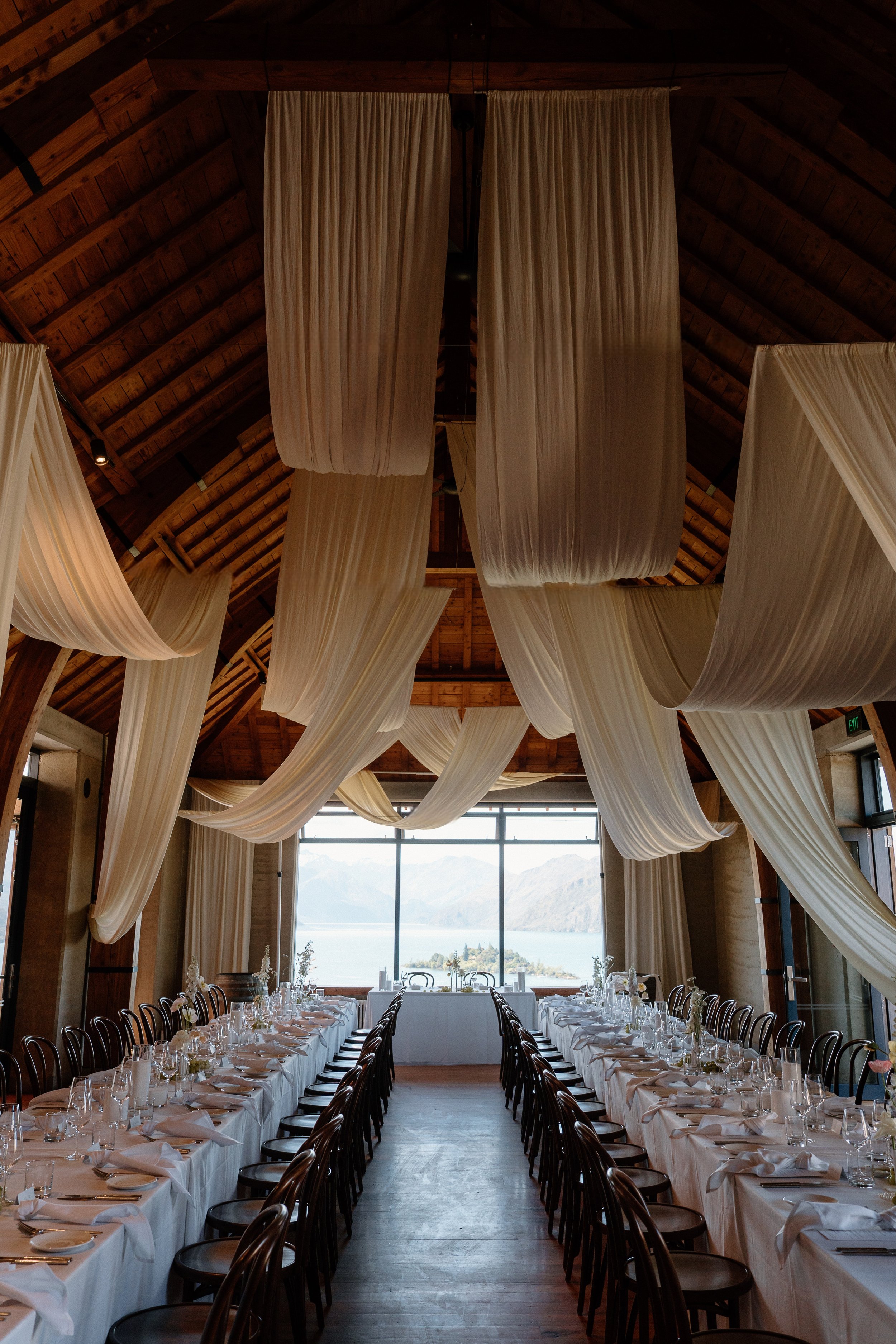 Wanaka wedding venue styling with ceiling draping, Rippon Hall — aMoment Wedding