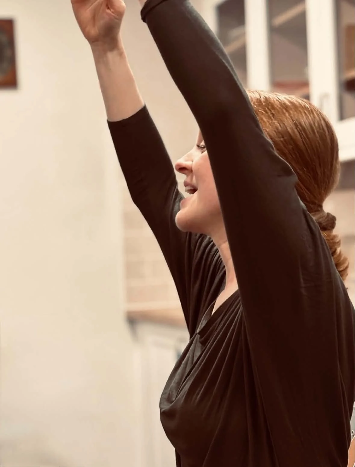Teacher teaching ballet
