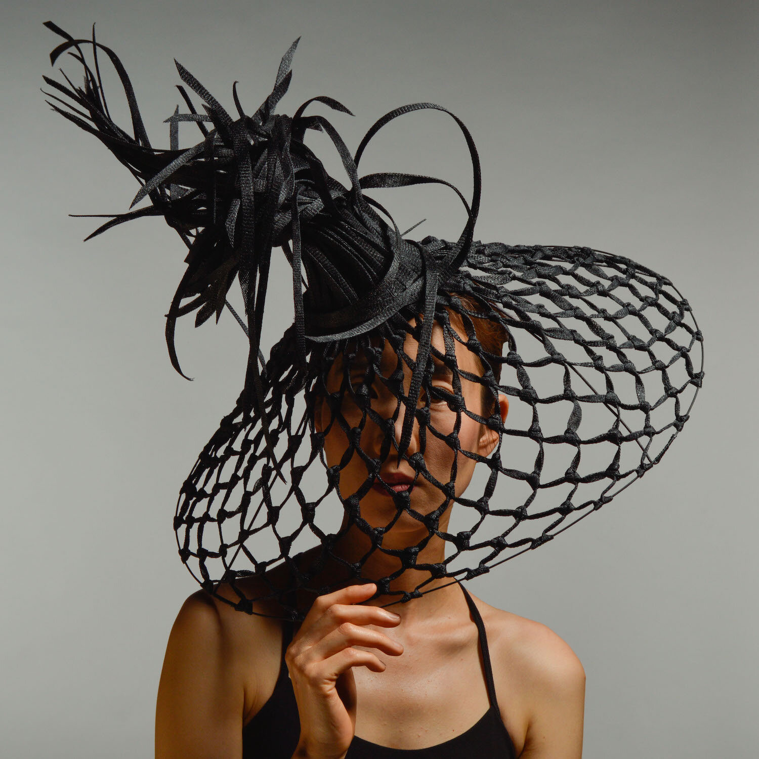sinamay-fashion-veiled-headpiece.jpg