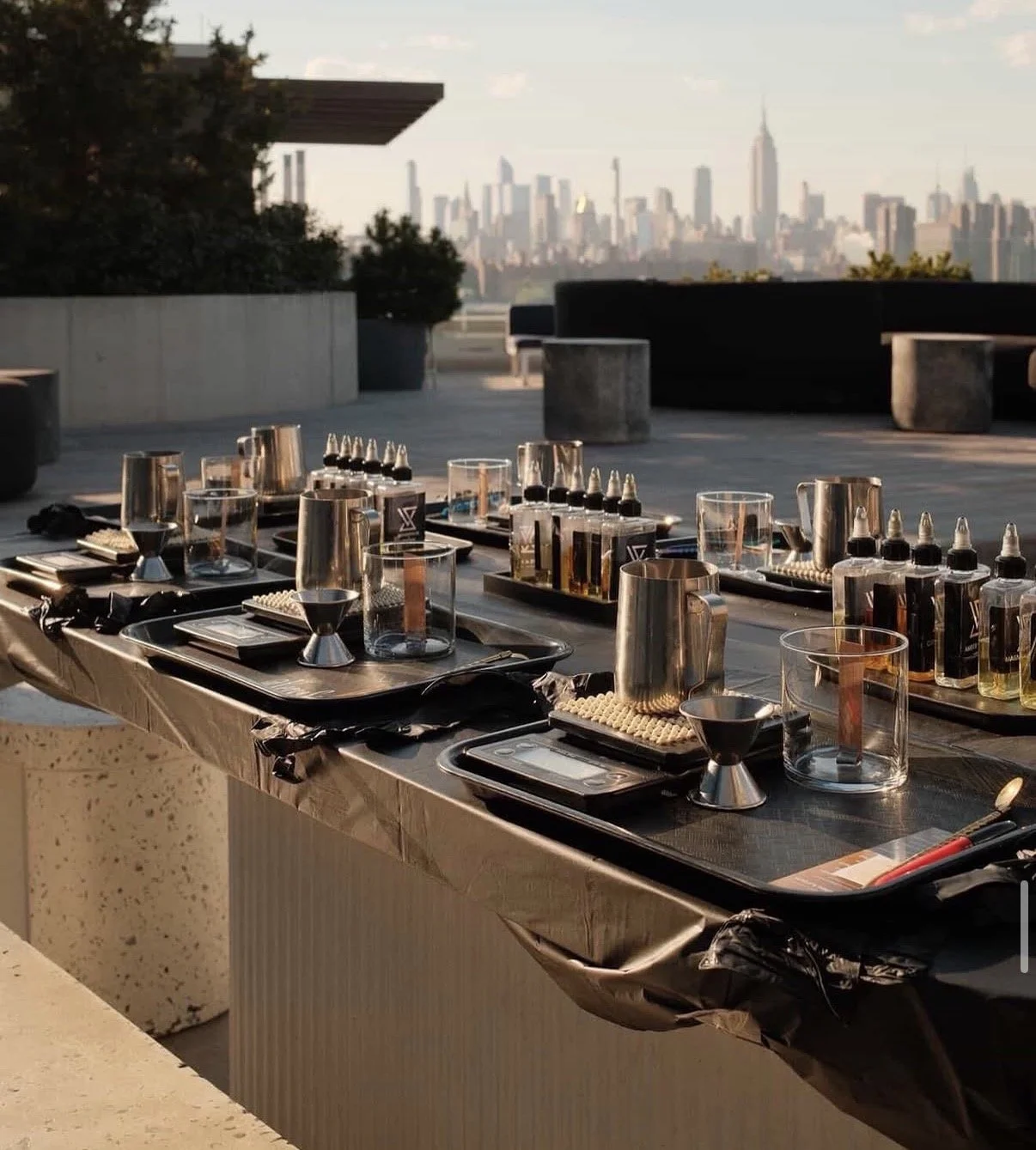 Luxury candle making workshop set up for an outdoor corporate event overlooking New York City