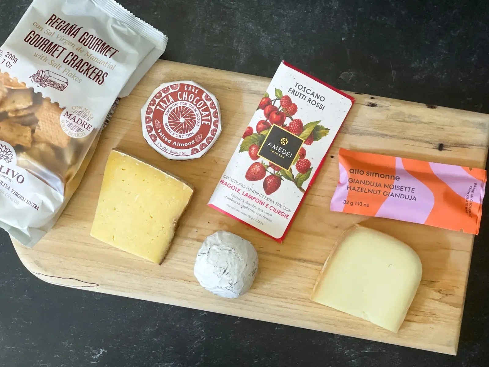 Virtual chocolate and cheese tasting experience kit designed for client engagement and relationship building.