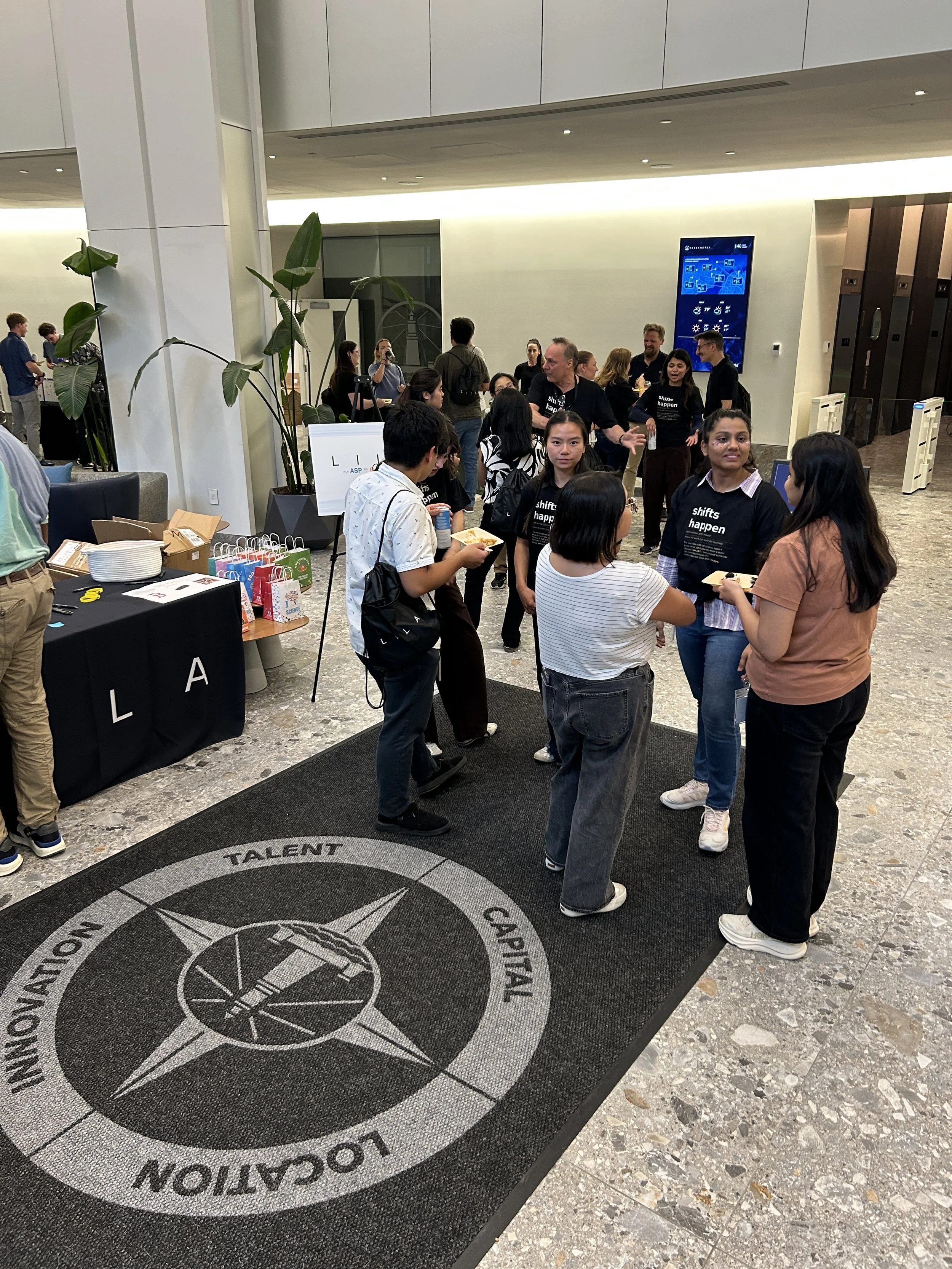 Group of people at a office happy hour powered by HOST Events
