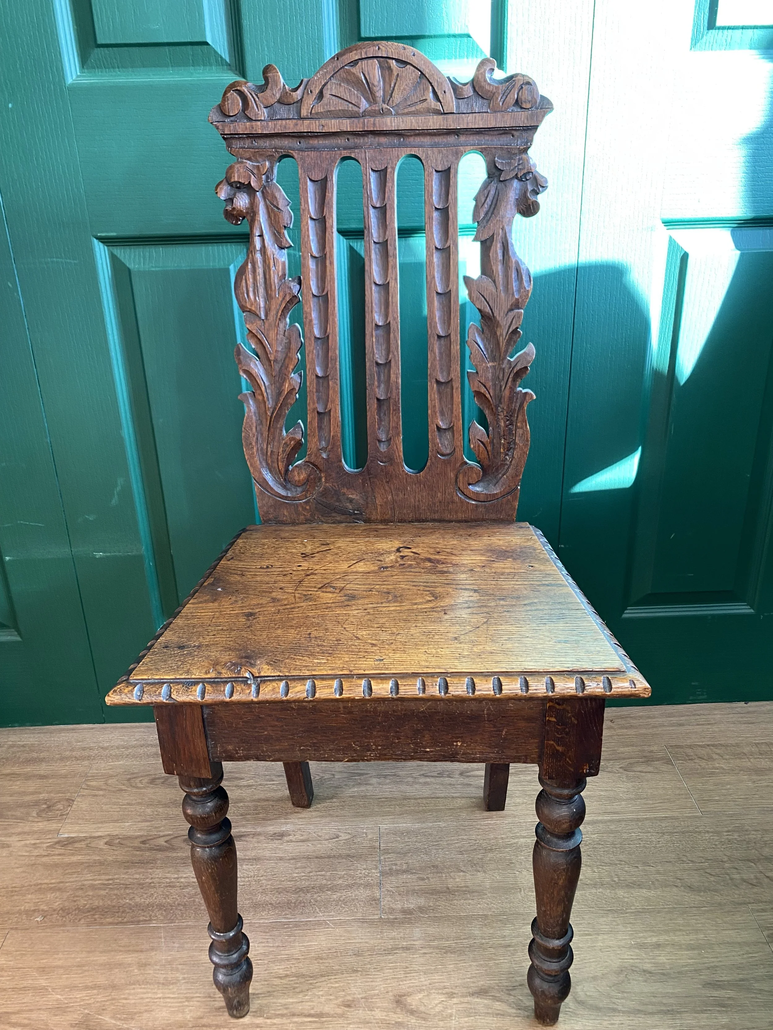 Antique Victorian solid oak carved hall chair
