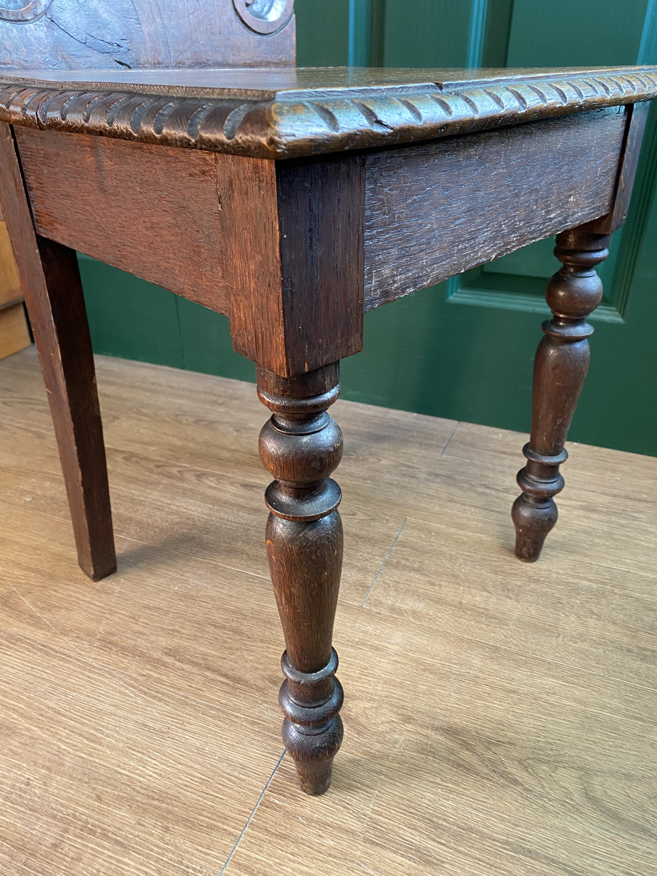 Antique Victorian solid oak carved hall chair