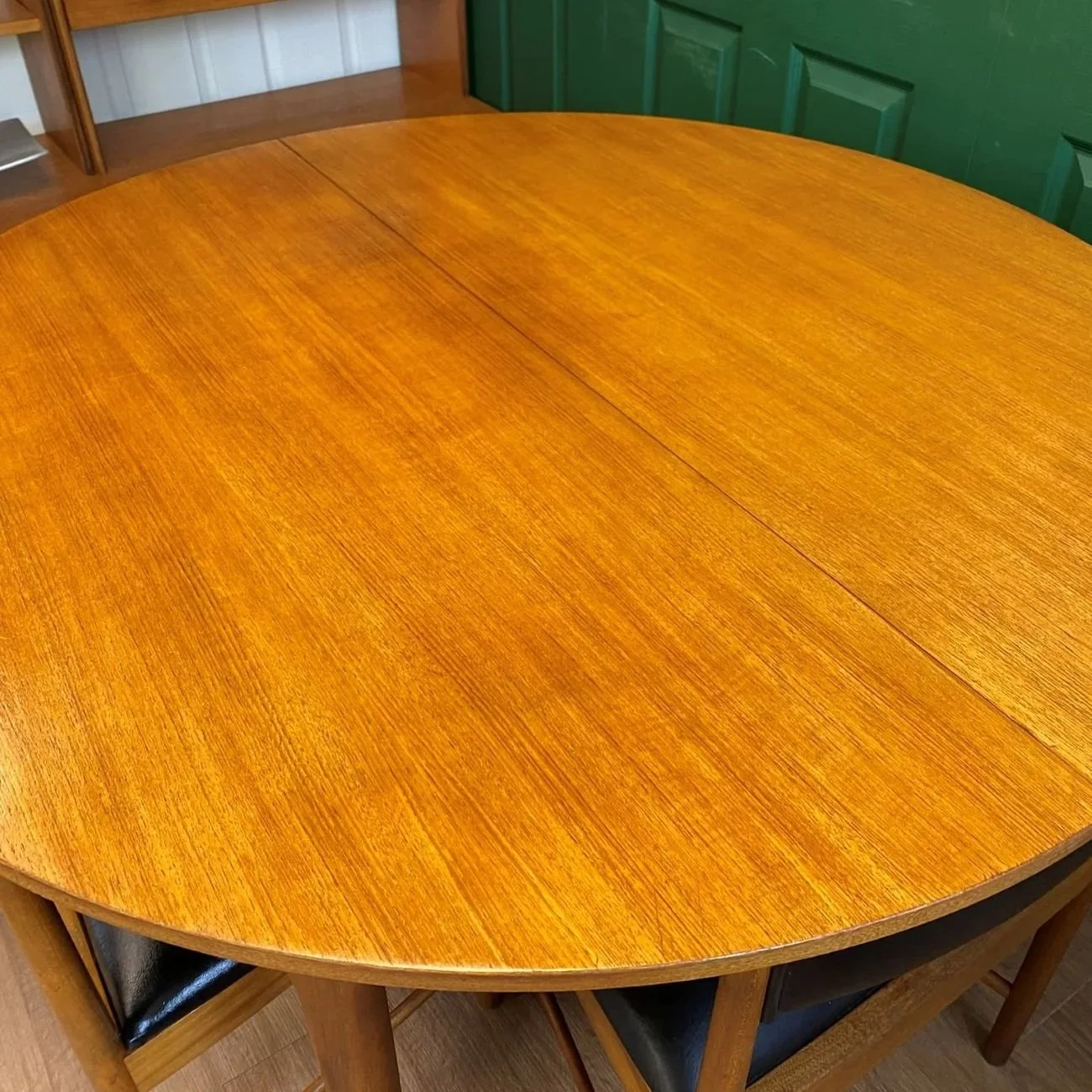 Restored Iconic 1960s McIntosh Circular Teak Extending Dining Table And Four Tuck Under Black Vinyl chairs