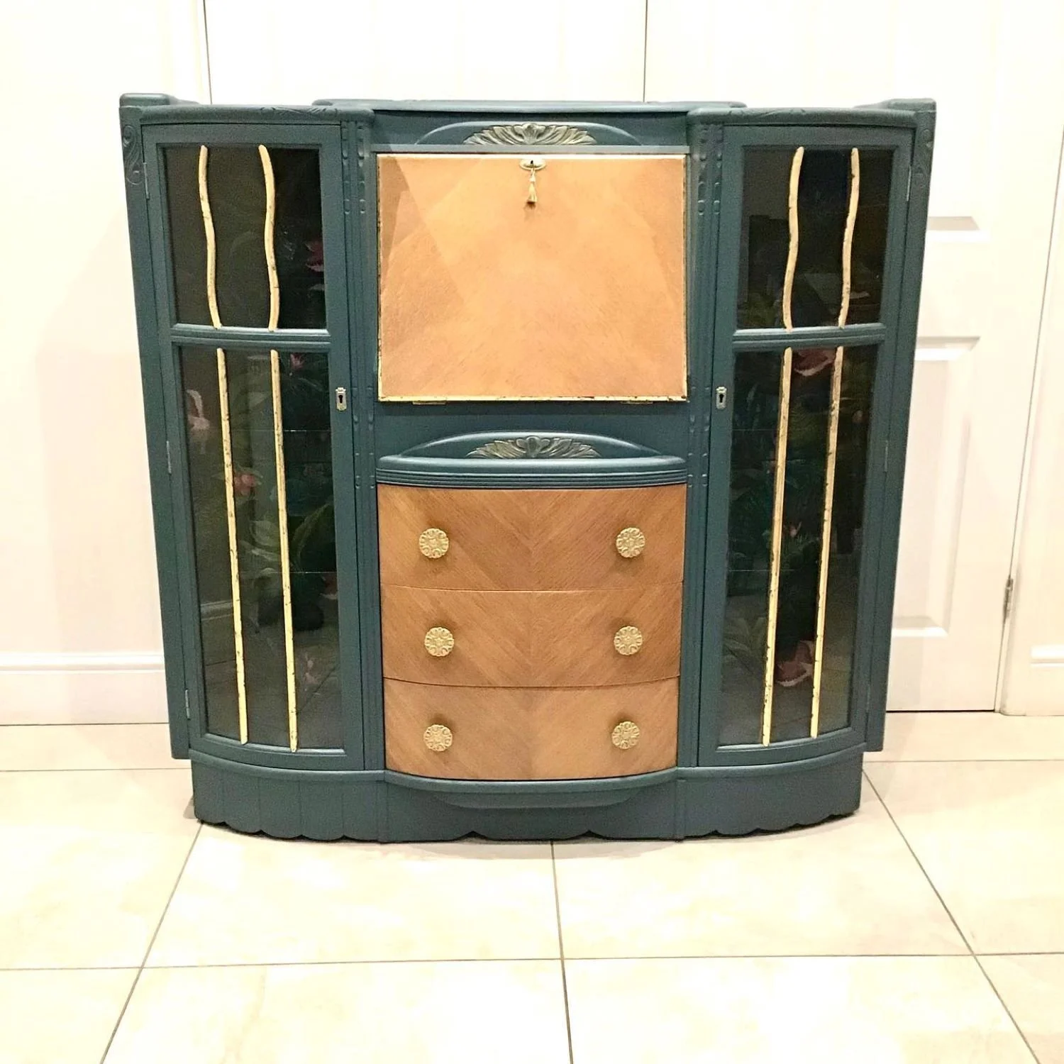 Blue and gold cocktail cabinet