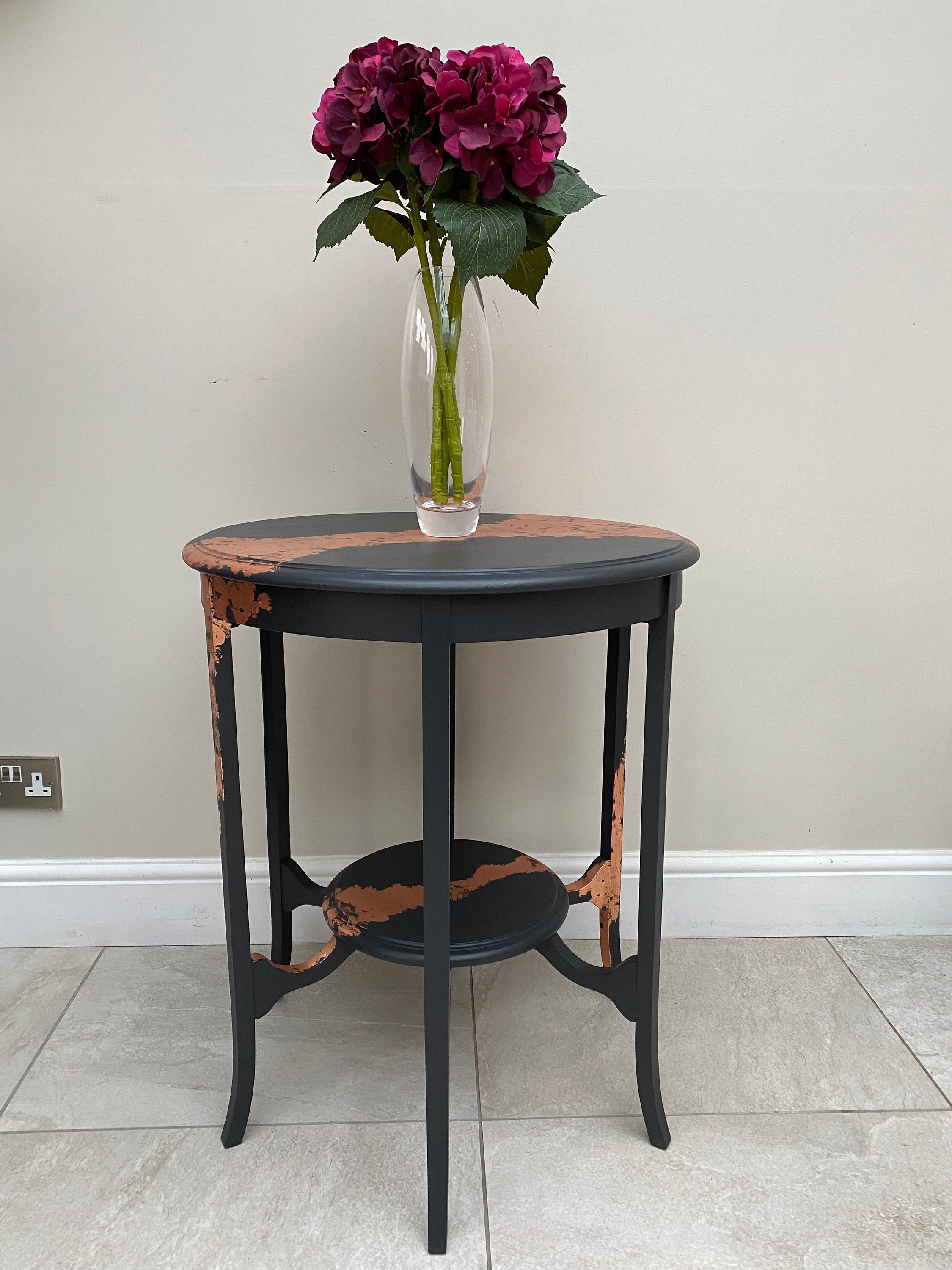 Refurbished antique solid mahogany two tier side table, painted in Ash Grey fusion mineral paint and finished with copper leaf.