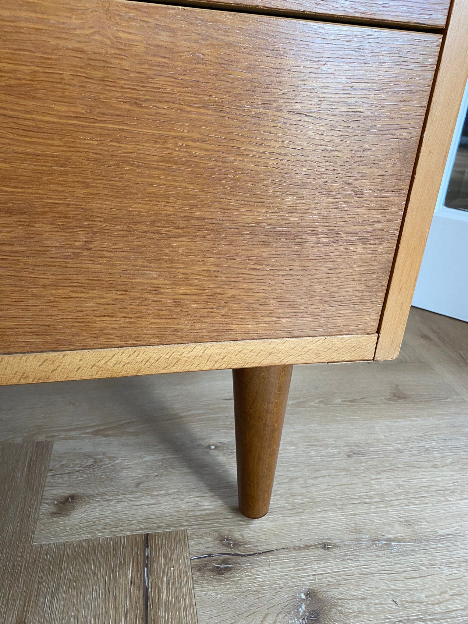 Mid century teak chest of three drawers with metal handles