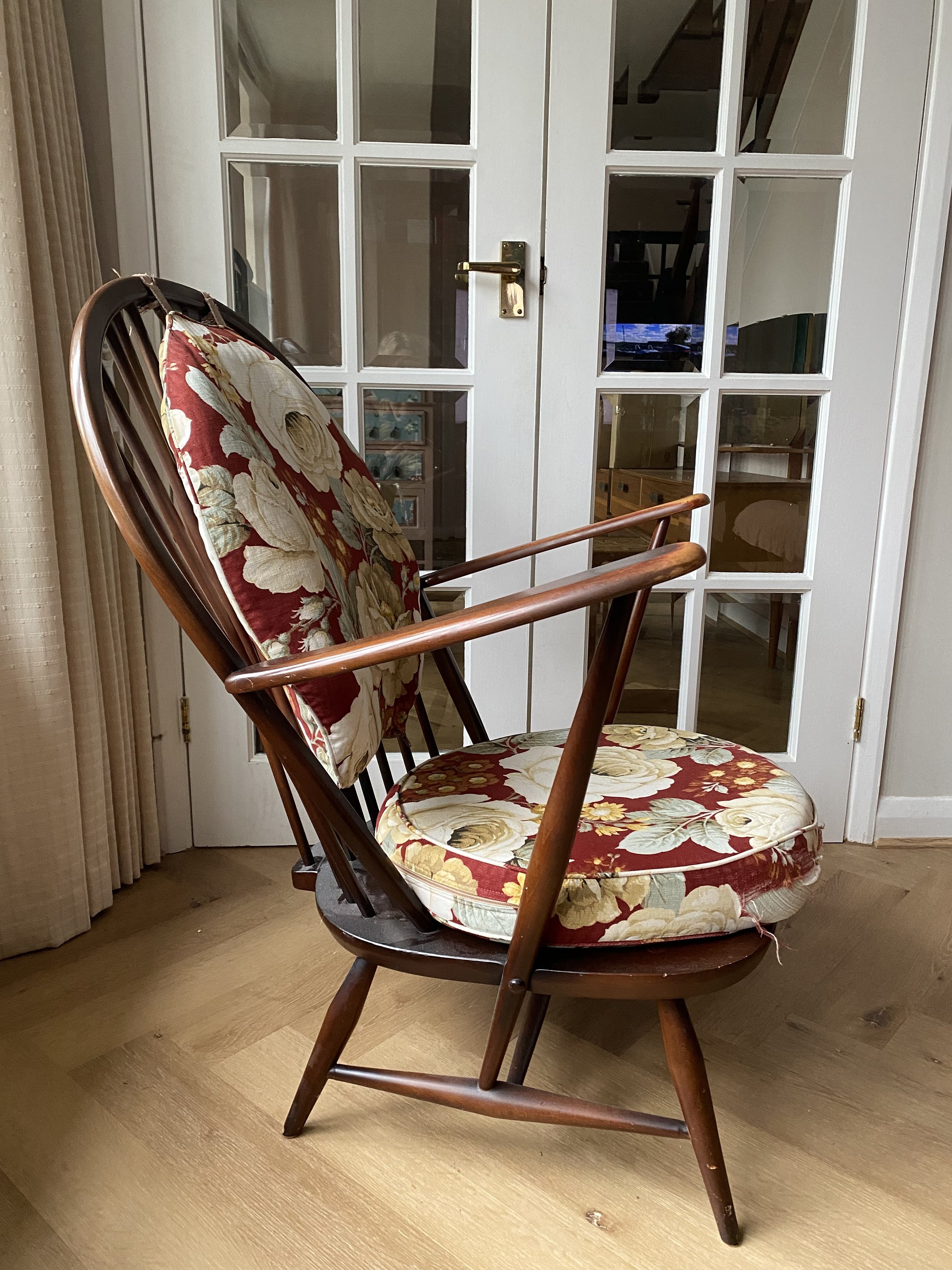 Vintage Ercol 1970s fleur de lis back armchair