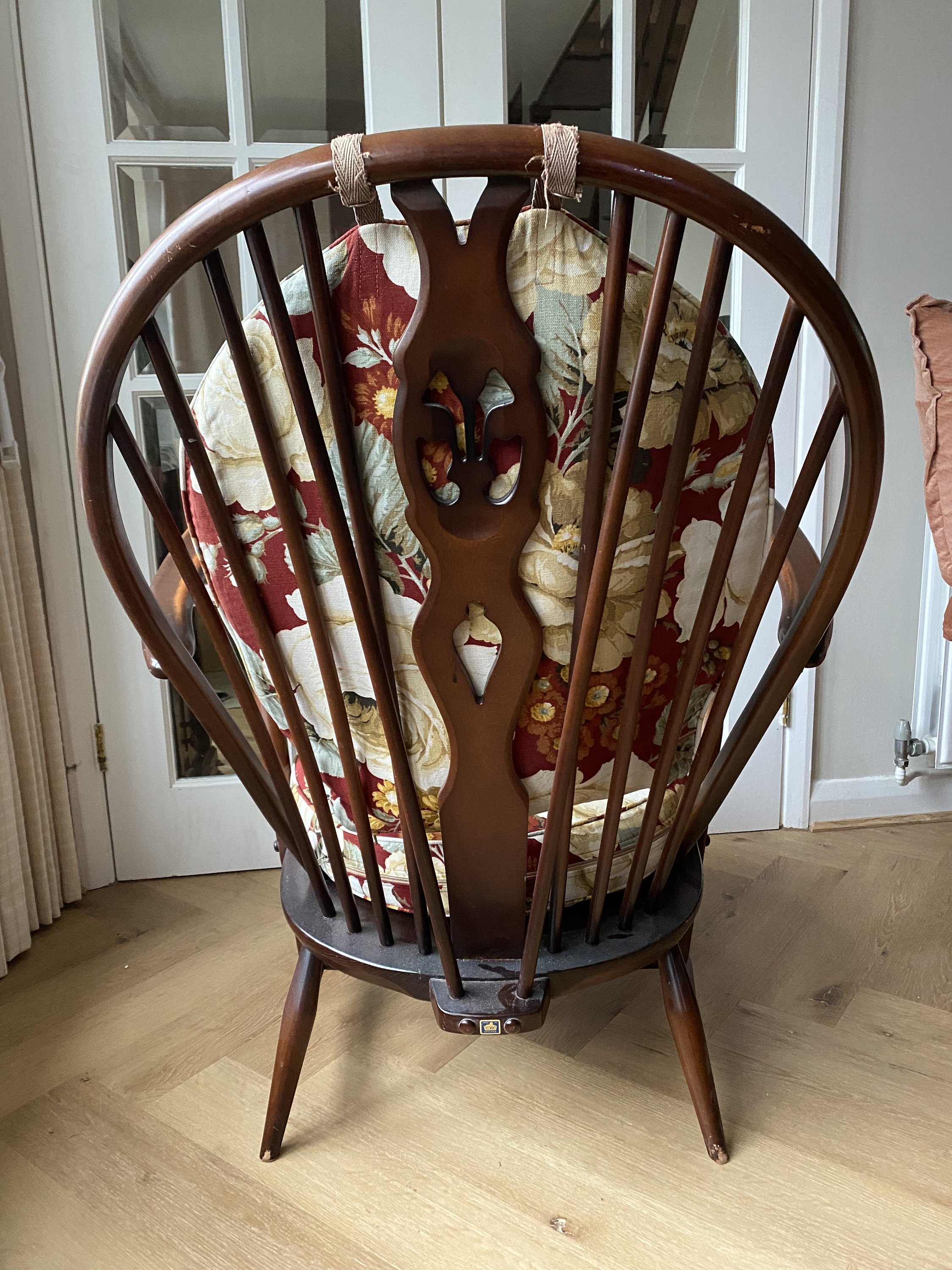 Vintage Ercol 1970s fleur de lis back armchair