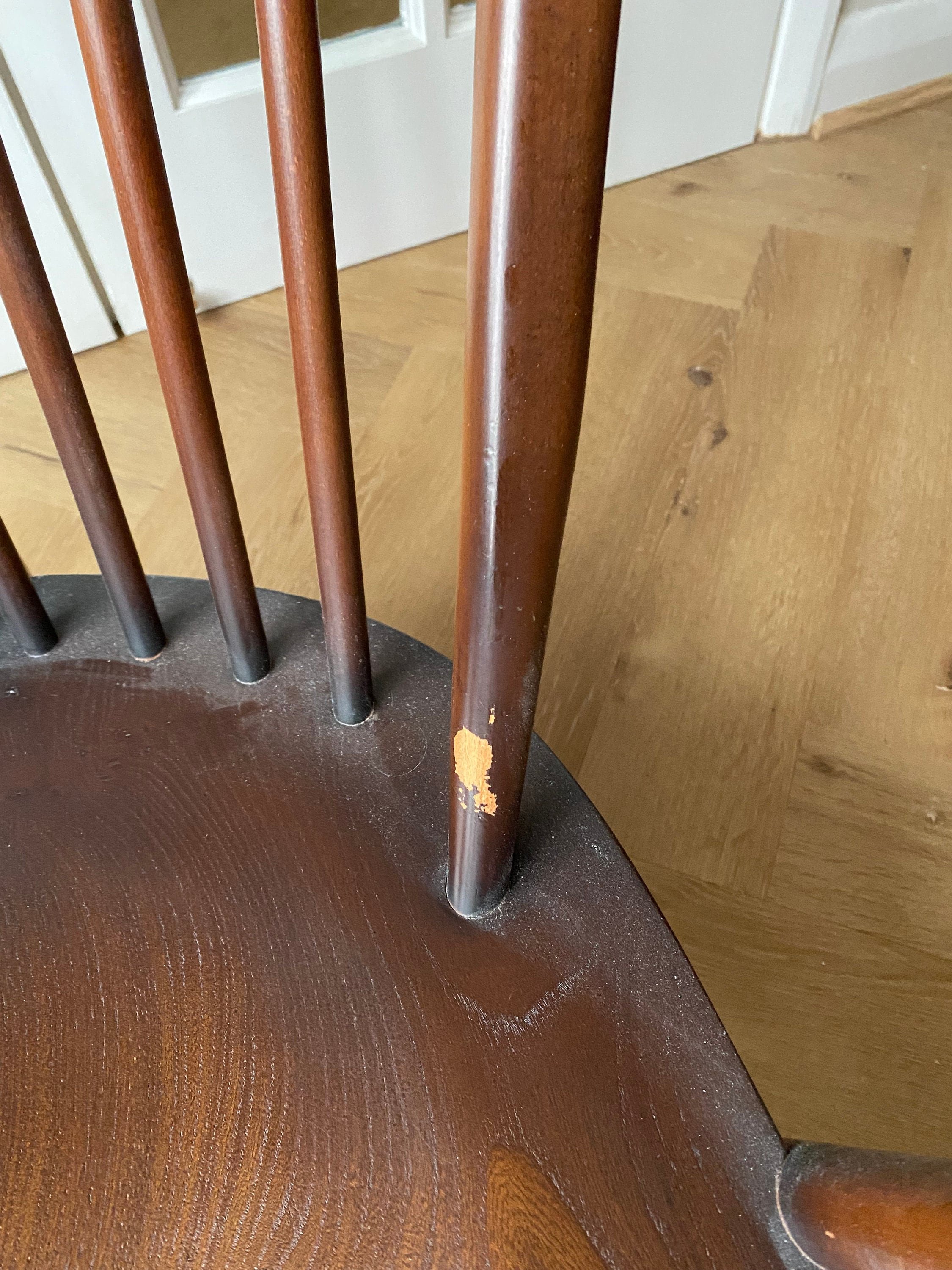 Vintage Ercol 1970s fleur de lis back armchair