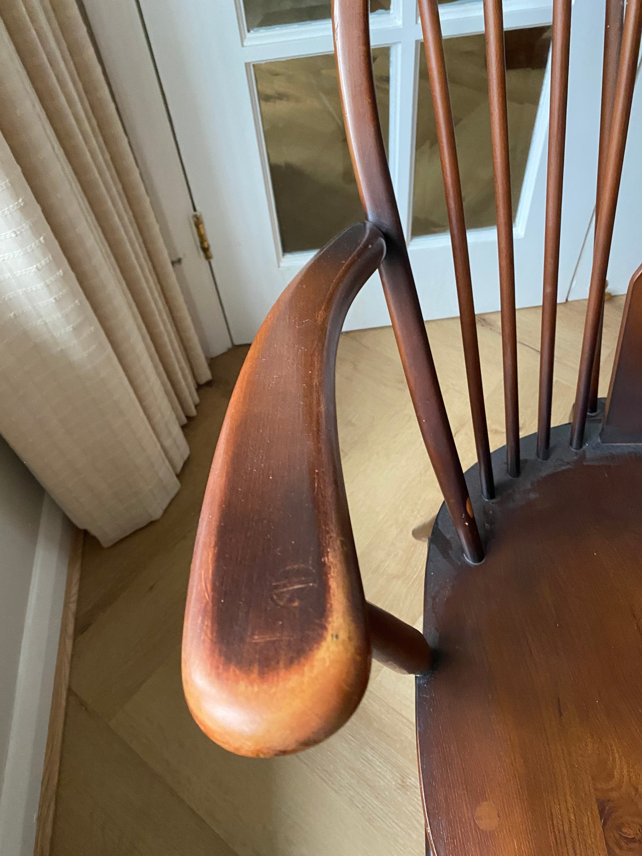 Vintage Ercol 1970s fleur de lis back armchair