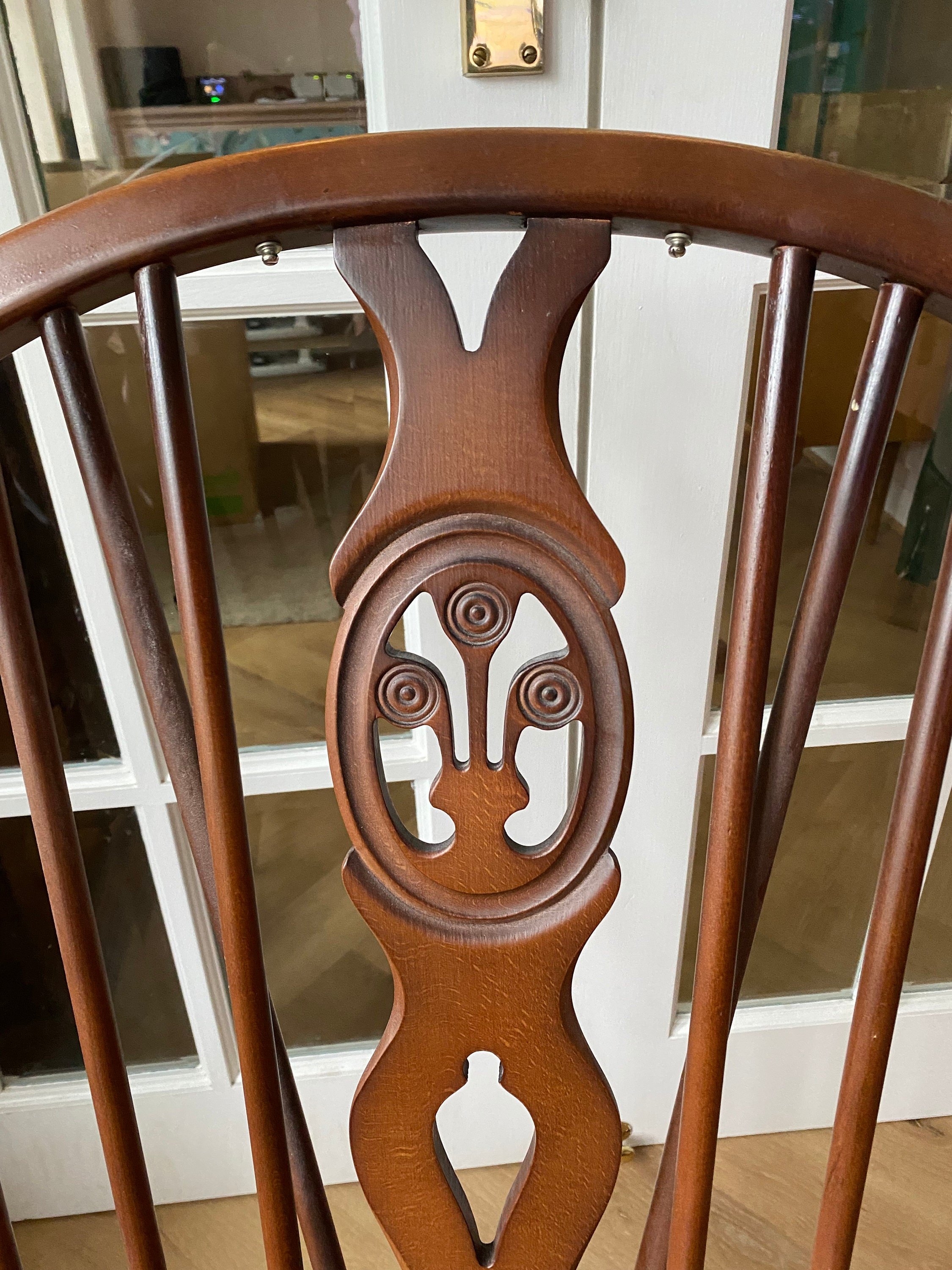 Vintage Ercol 1970s fleur de lis back armchair