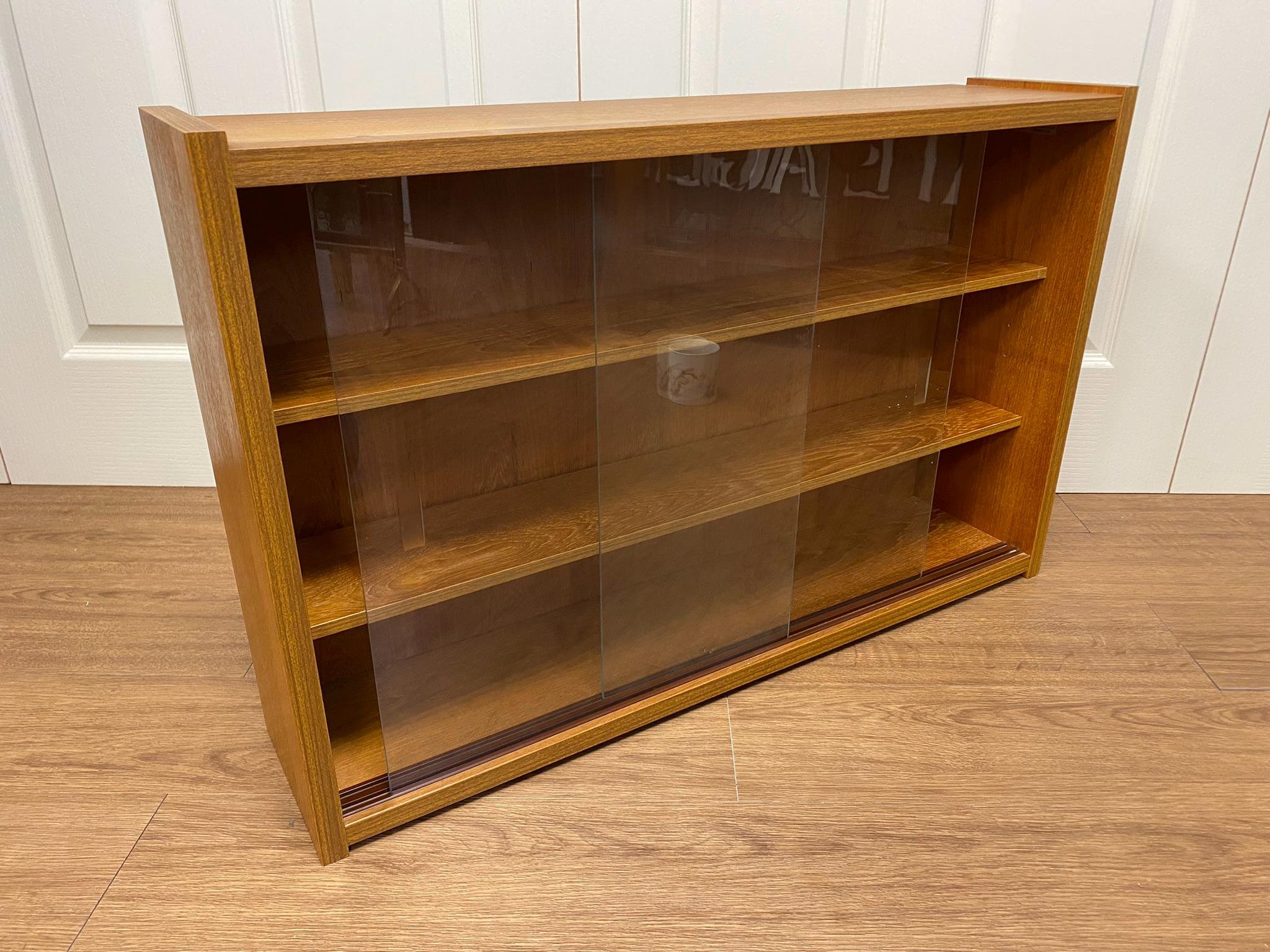 1960s mid century teak PS System, Danish Furniture glass sliding door floating wall cabinet design number 3309