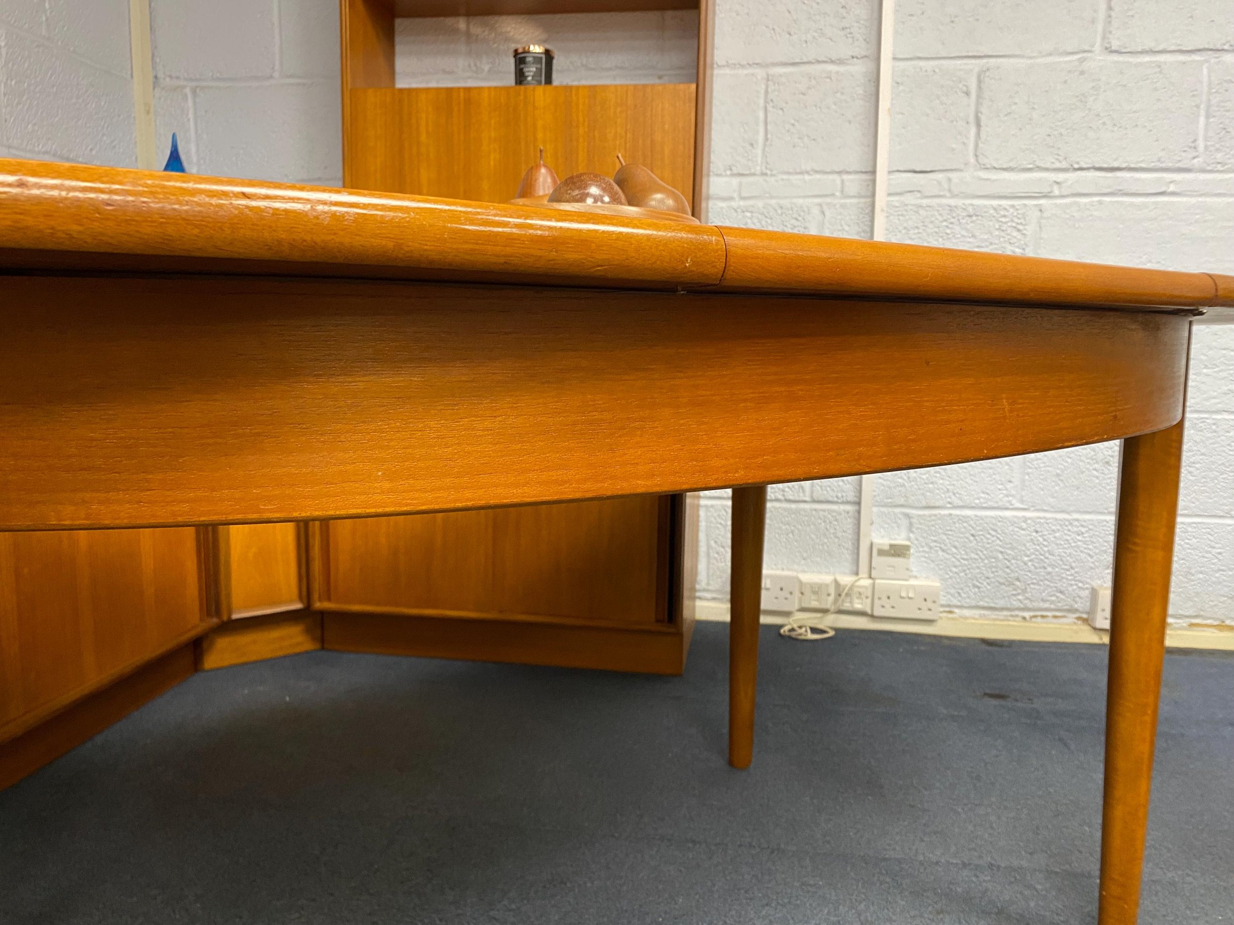 Mid century 1960s Danish style solid teak extending oval dining table
