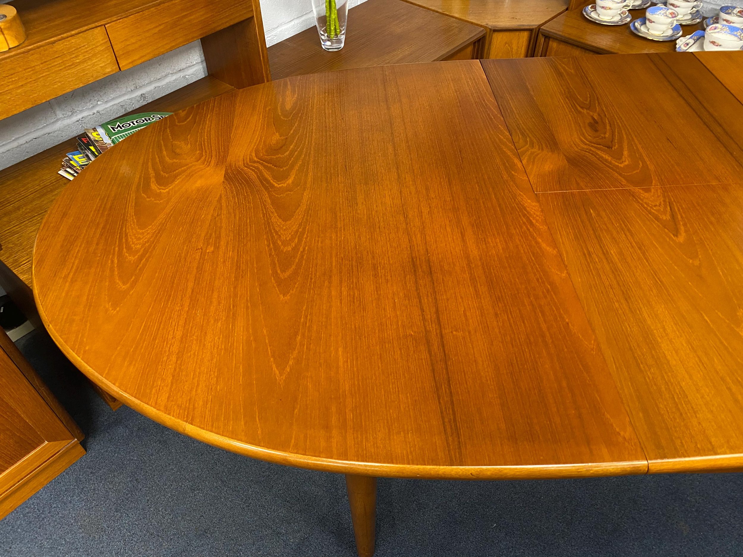 Mid century 1960s Danish style solid teak extending oval dining table
