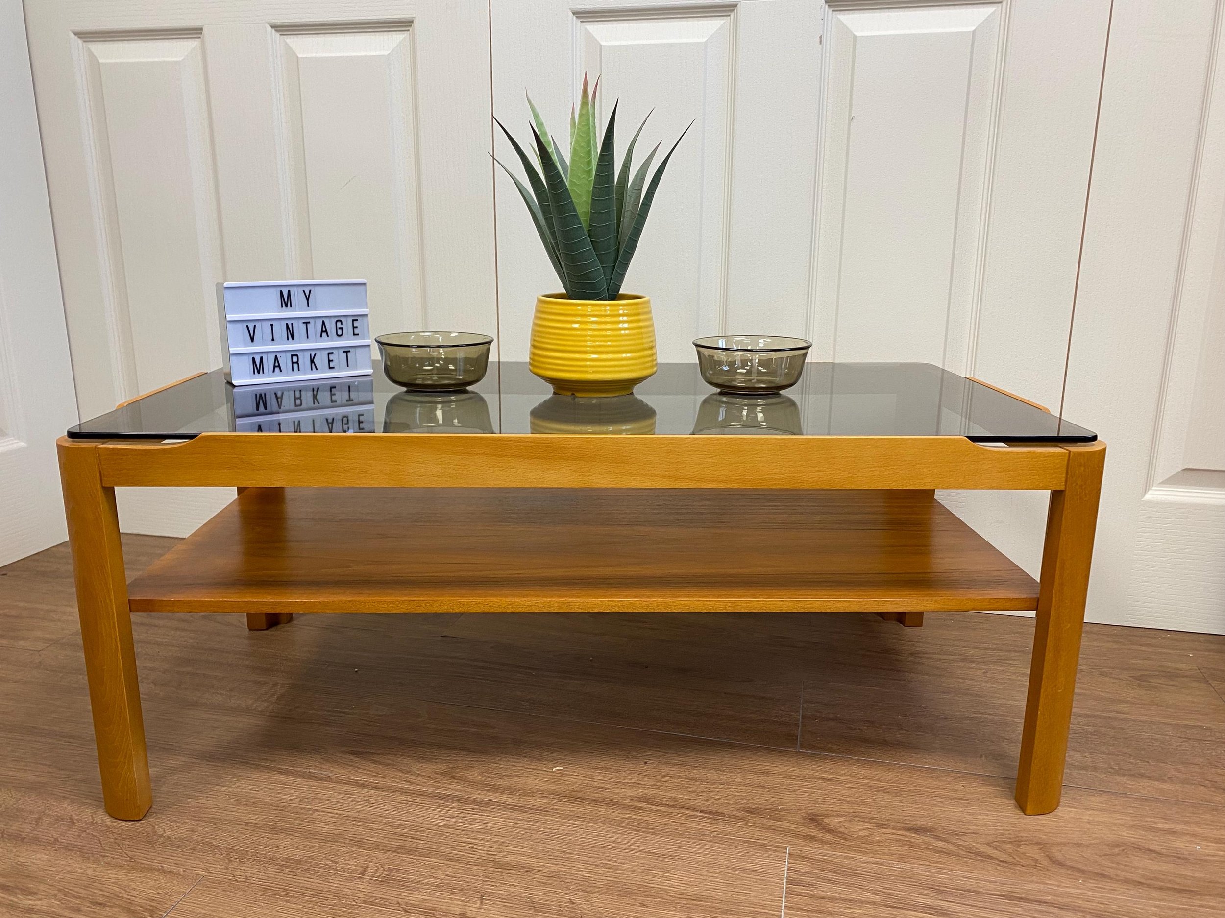 Mid century two tier teak and smoked glass coffee table by Myer