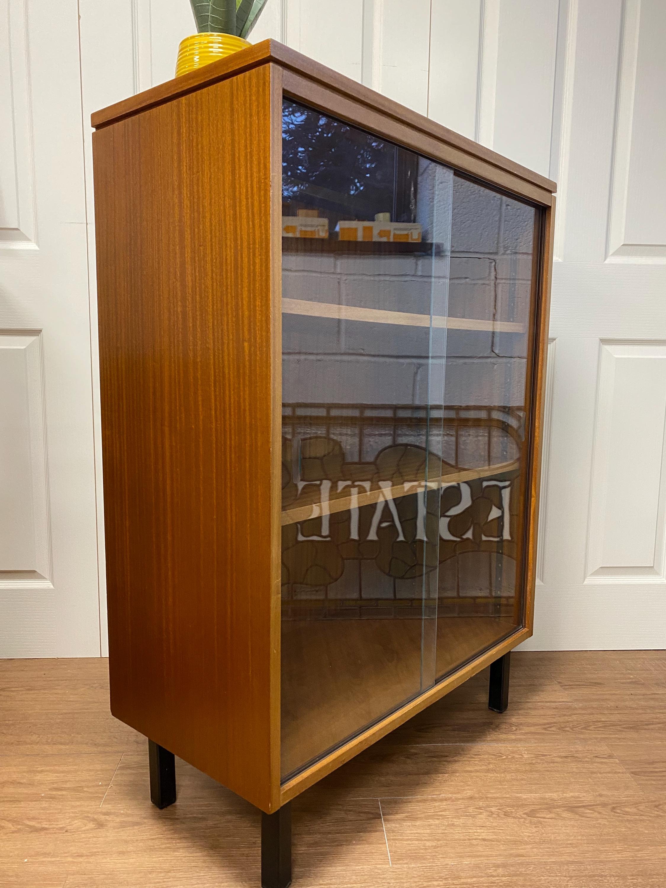 Mid century teak glazed sliding door bookcase