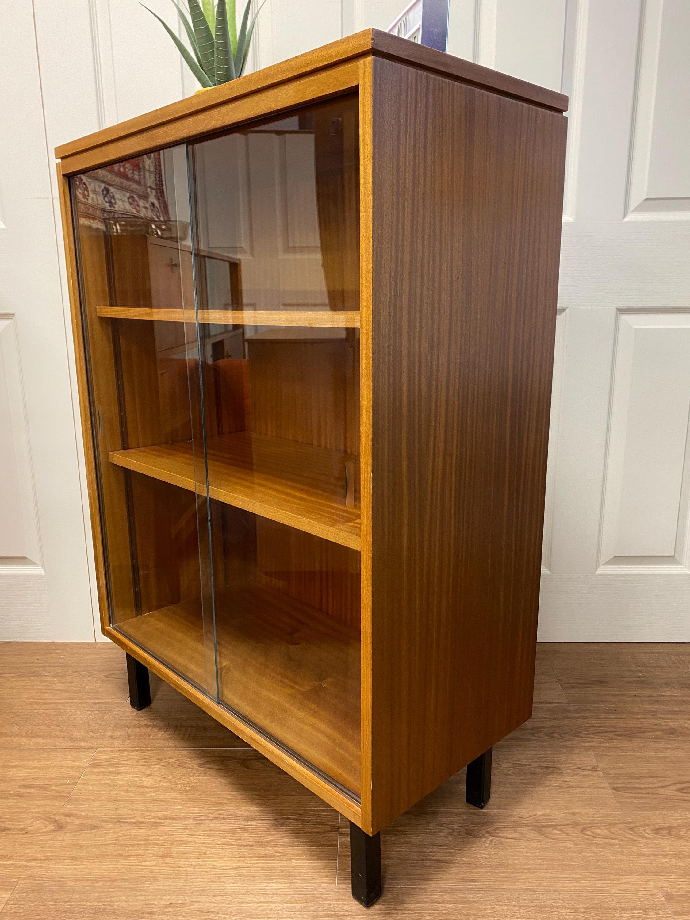 Mid century teak glazed sliding door bookcase