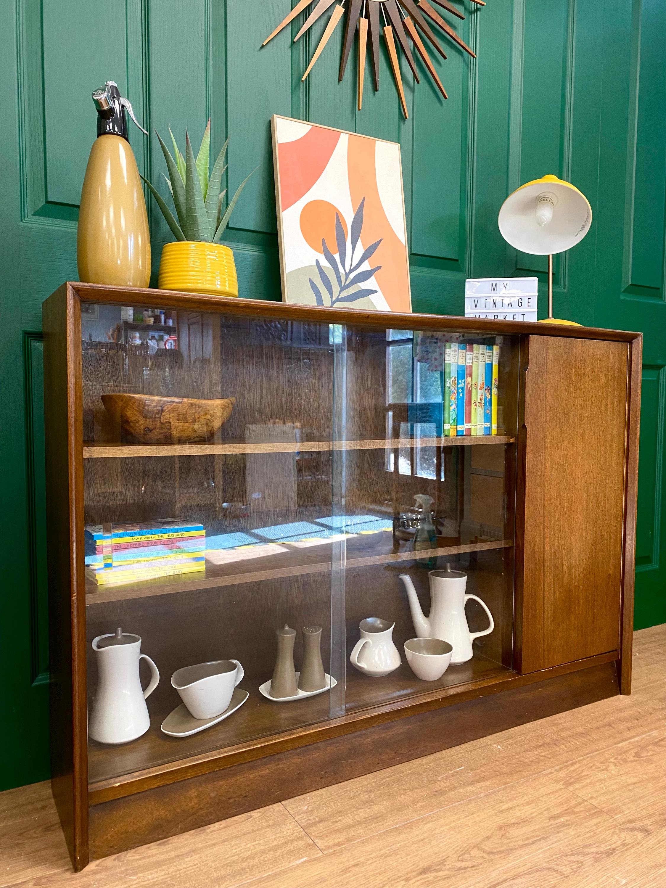 Herbert E Gibbs Autograph Collection mid century late 1960s teak slanting sliding door glass display cabinet sideboard bookcase