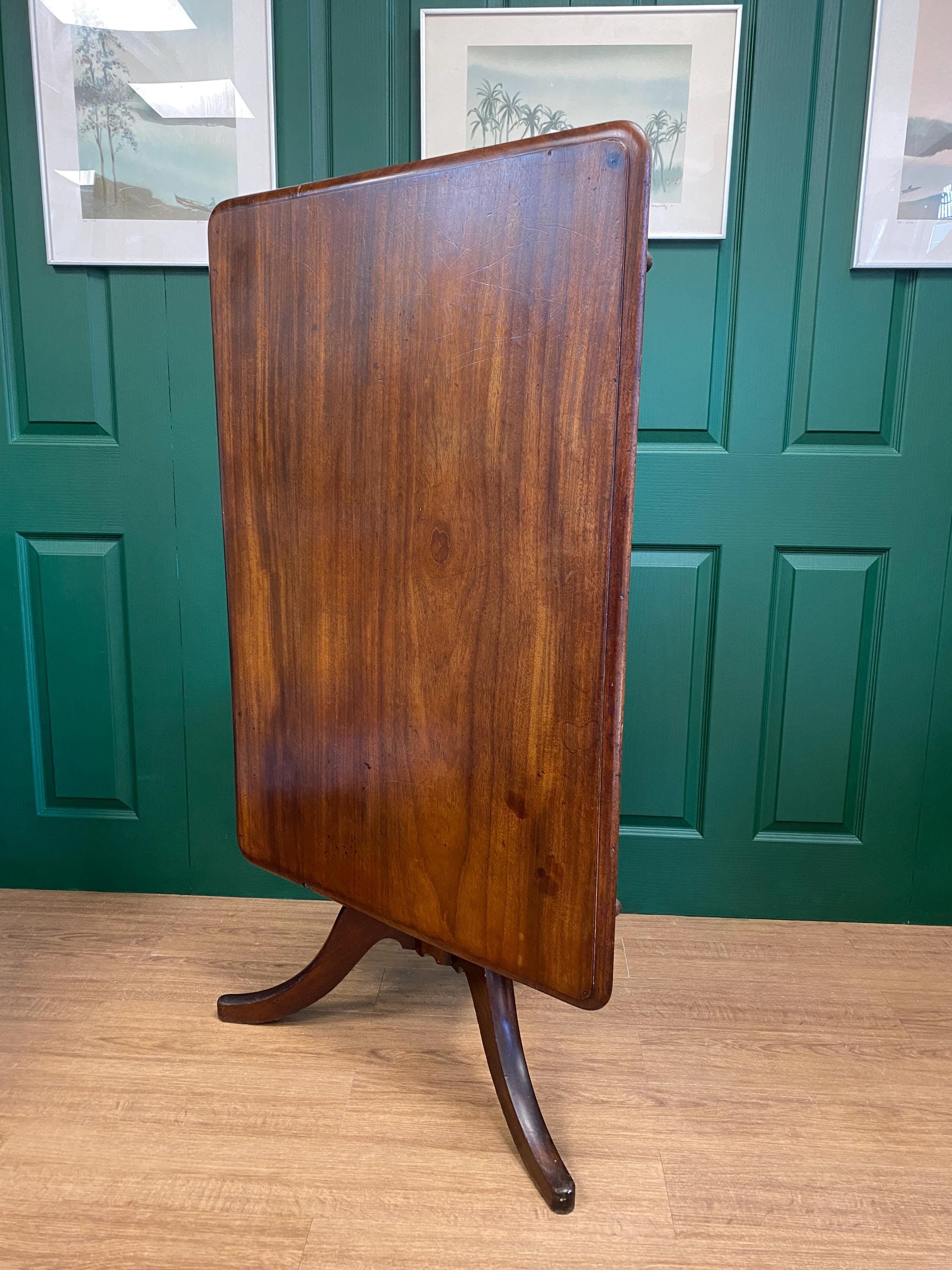 Late Georgian/early Victorian rectangular mahogany tilt top tripod table