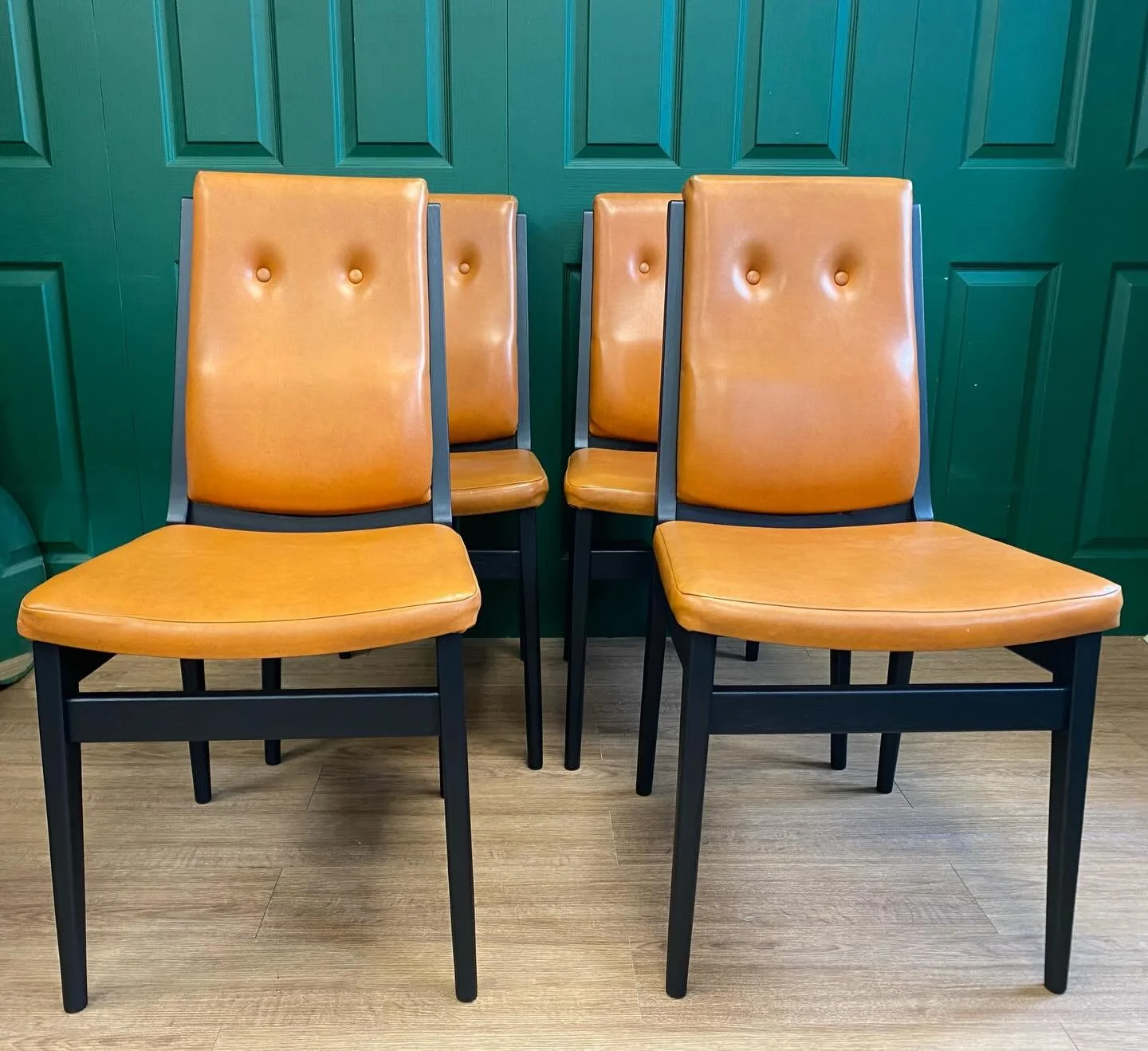 Freshly refurbished!

These fabulous mid century retro 1970s dining chairs have been refreshed. The wood was tired and chipped so I have painted them in Coal Black to contrast with the original burnt orange vinyl. The vinyl has been repaired where it