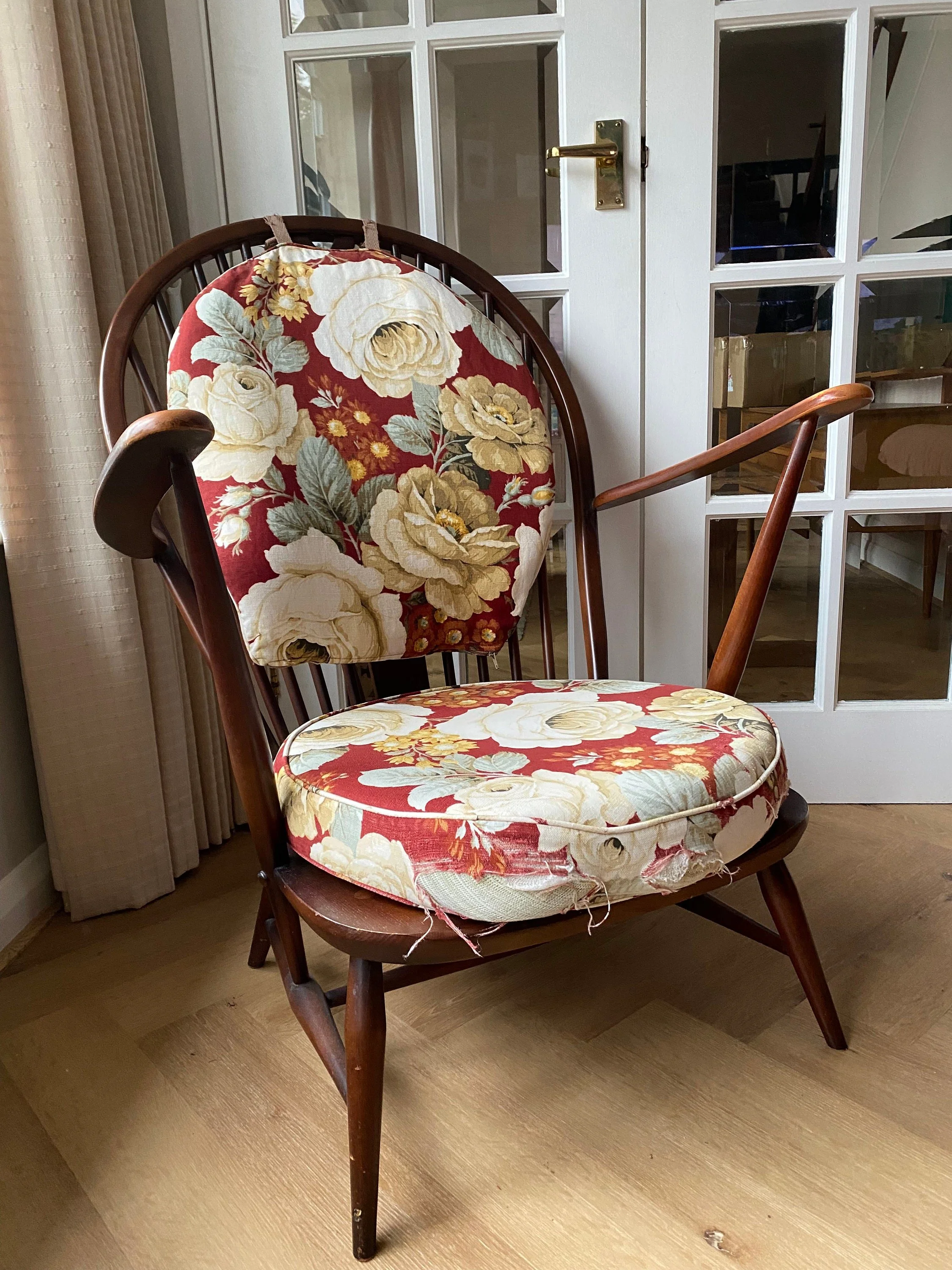 Vintage Ercol 1970s fleur de lis back armchair