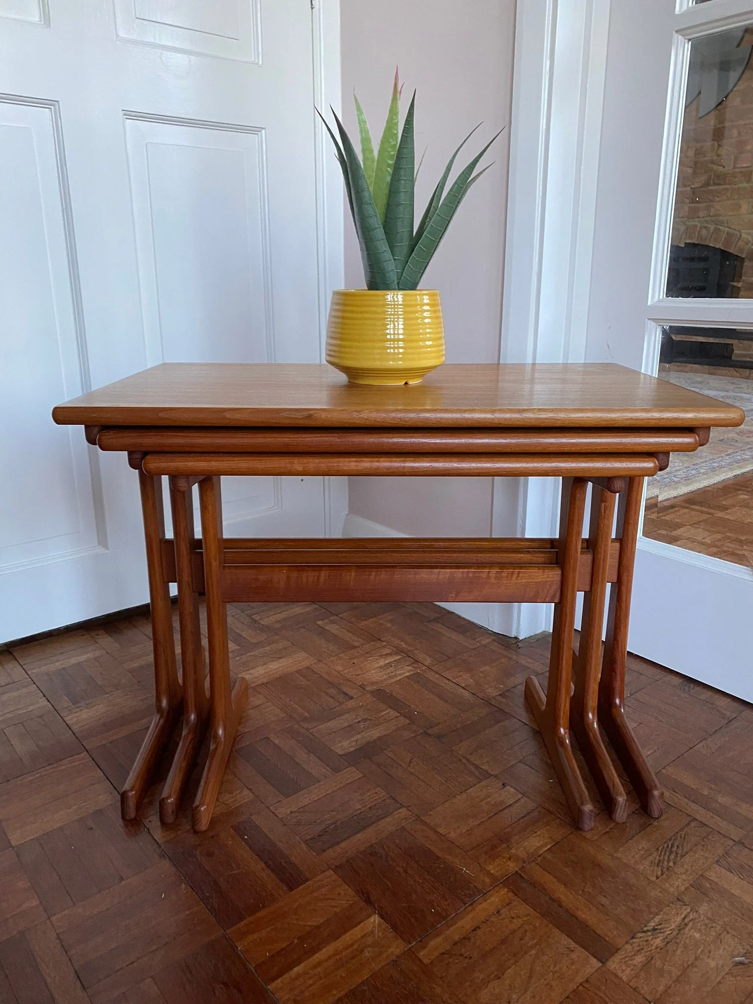 Mid century 1960s Danish style teak nest of three tables