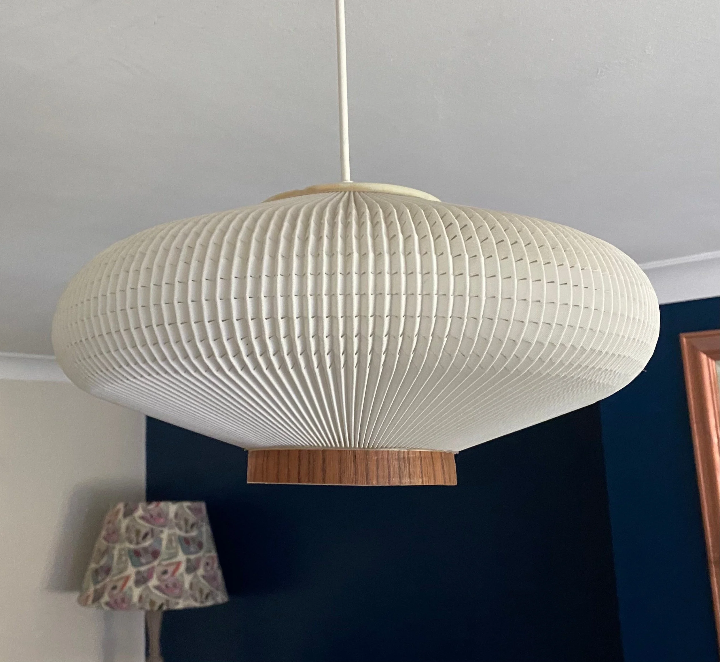 Rare vintage 1960s Danish style circular lamp shade. White pleated acrylic with teak strip, 1 of 2