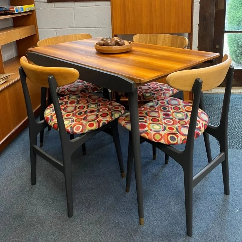 Restored and restyled mid century Danish style teak extending table and four butterfly style chairs