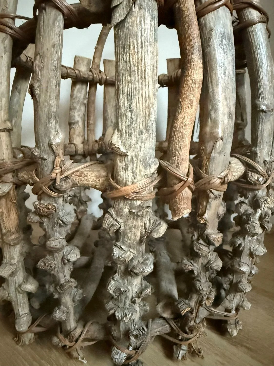 Rustic handmade Adirondack-style twig fire log bucket basket
