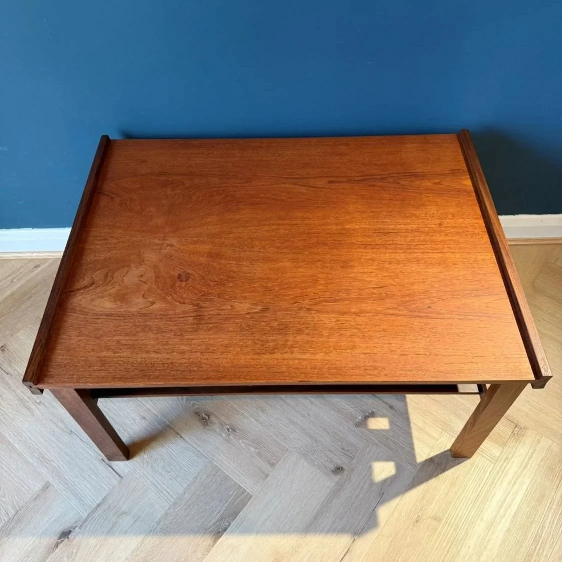 Vintage mid century 1960s two tier teak coffee table with slatted magazine rack