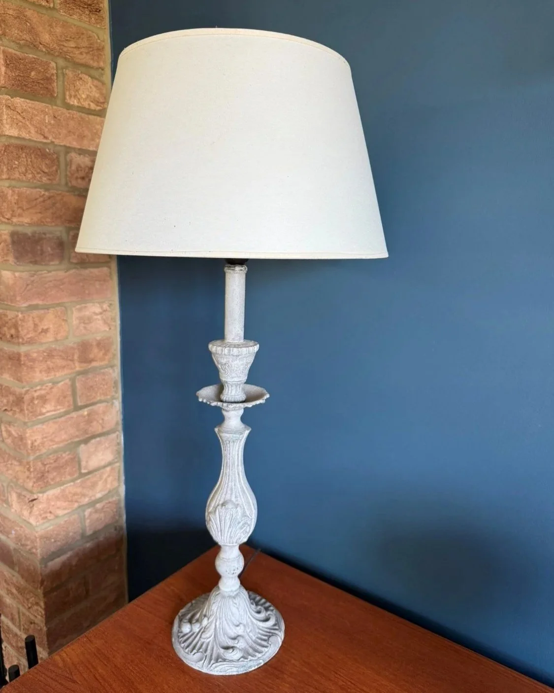 Contemporary antique style table lamp with ornate grey metal base
