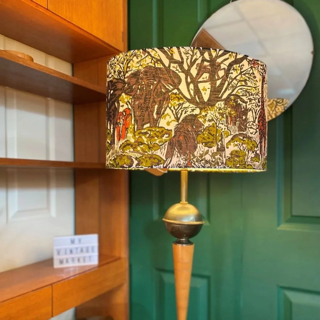 Mid+century+retro+1970s+brass+and+teak+floor+lamp+switched+on+orange+shade.jpg