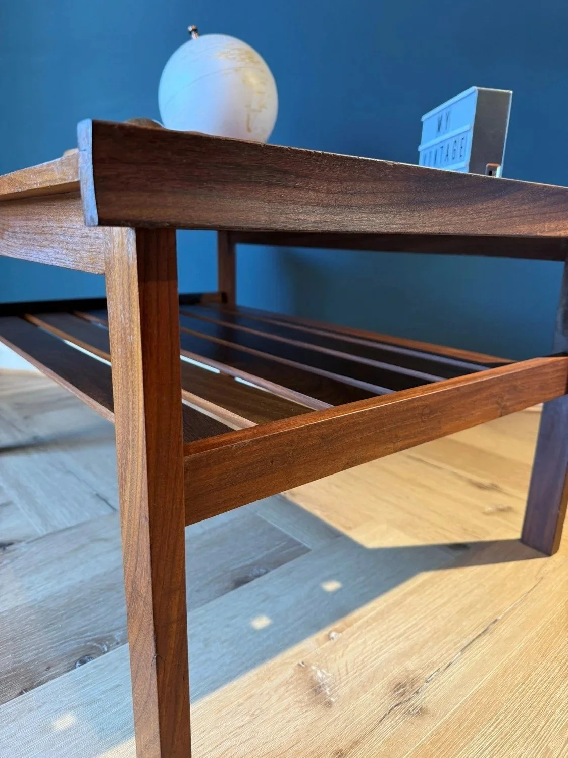 Vintage mid century 1960s two tier teak coffee table with slatted magazine rack