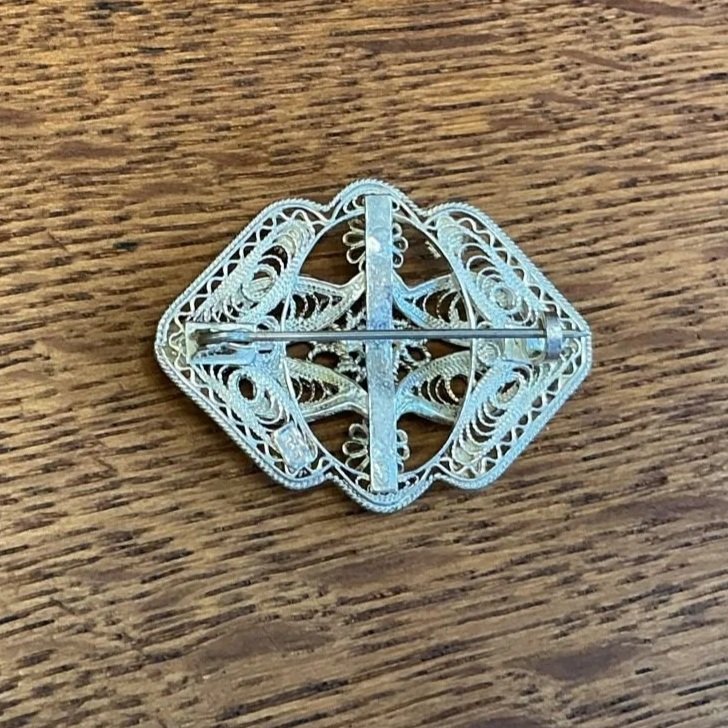 Antique silver filigree brooch